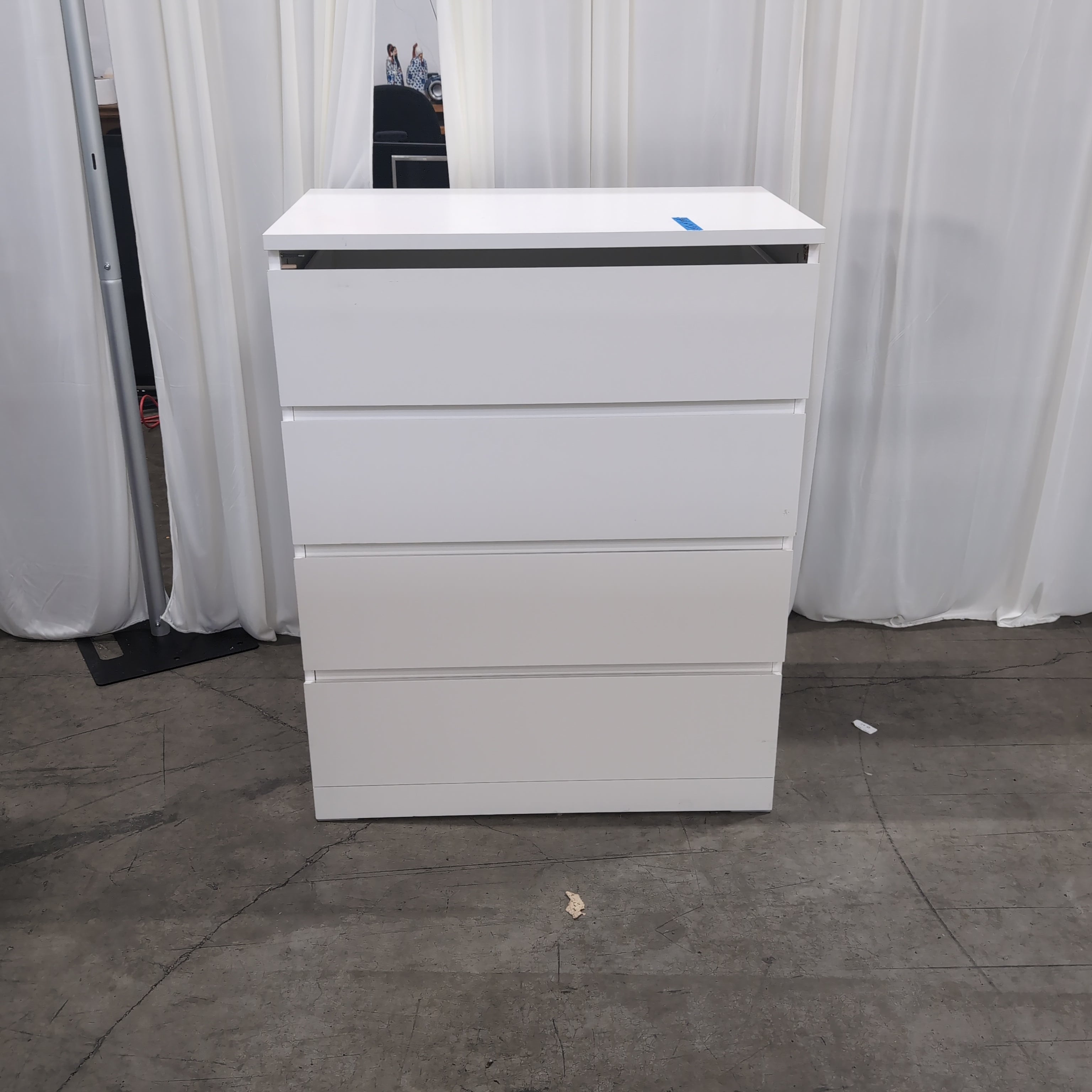 White Laminate Four-Drawer Dresser