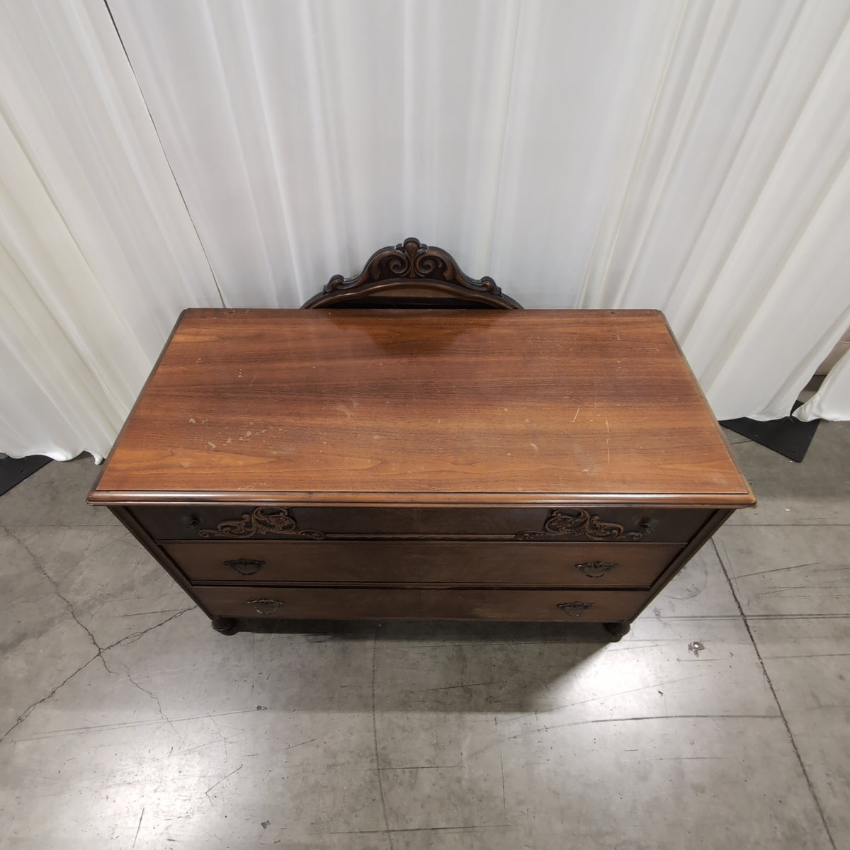 Vintage Brown Wood Three-Drawer Dresser with Carved Details