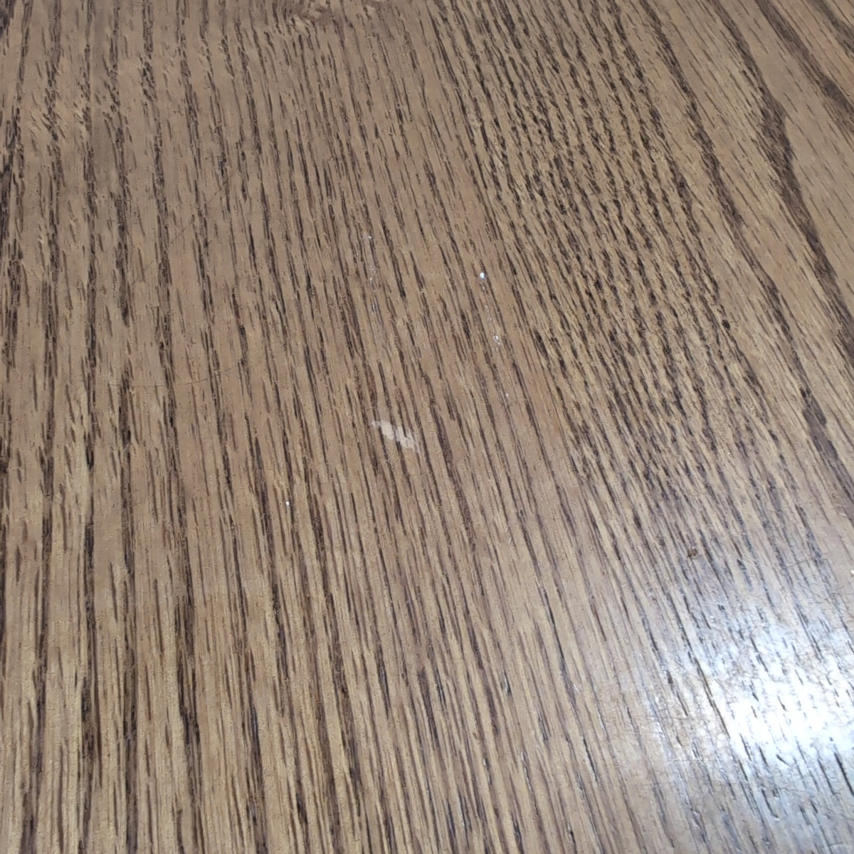 Reddish Brown Oval Pedestal Dining Table