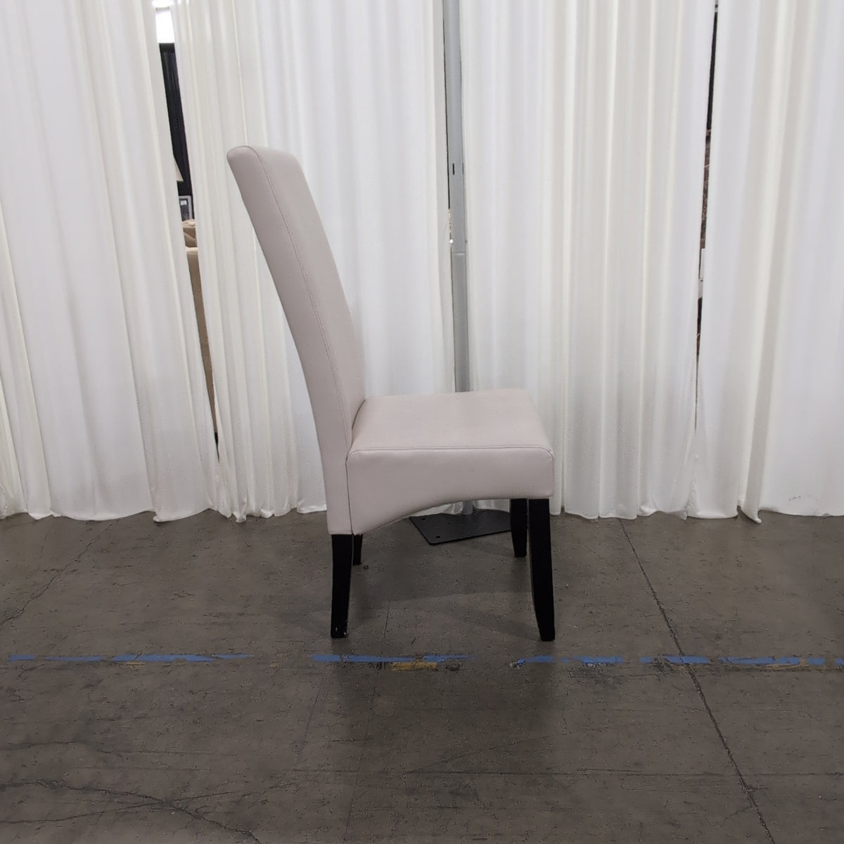 Cream Upholstered High-Back Dining Chair with Dark Legs