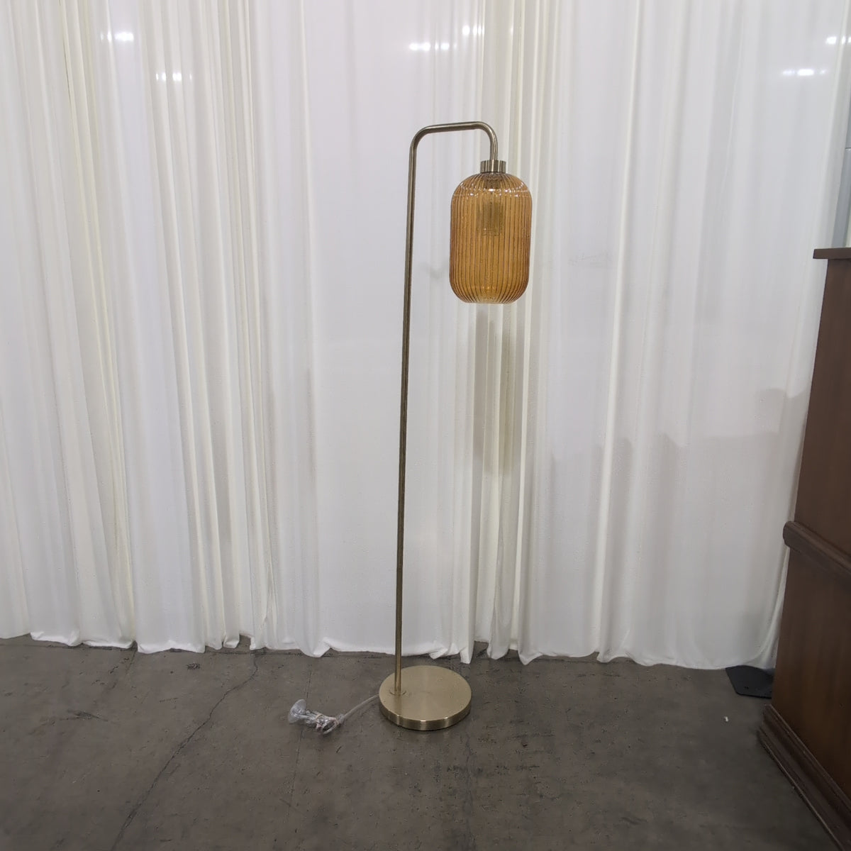 Gold-Tone Metal Floor Lamp with Amber Ribbed Glass Shade