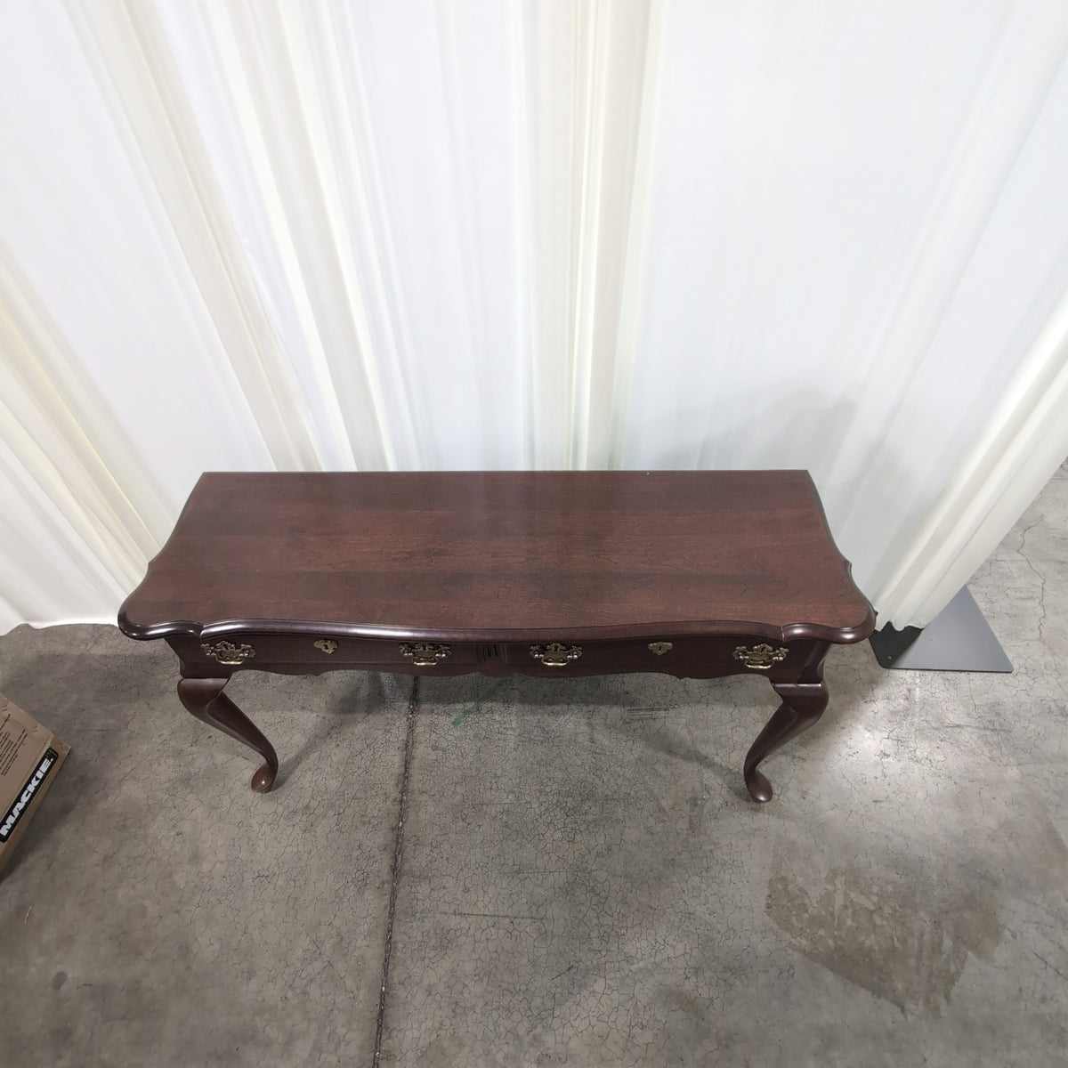 Traditional Dark Wood Console Table with Ornate Brass Hardware