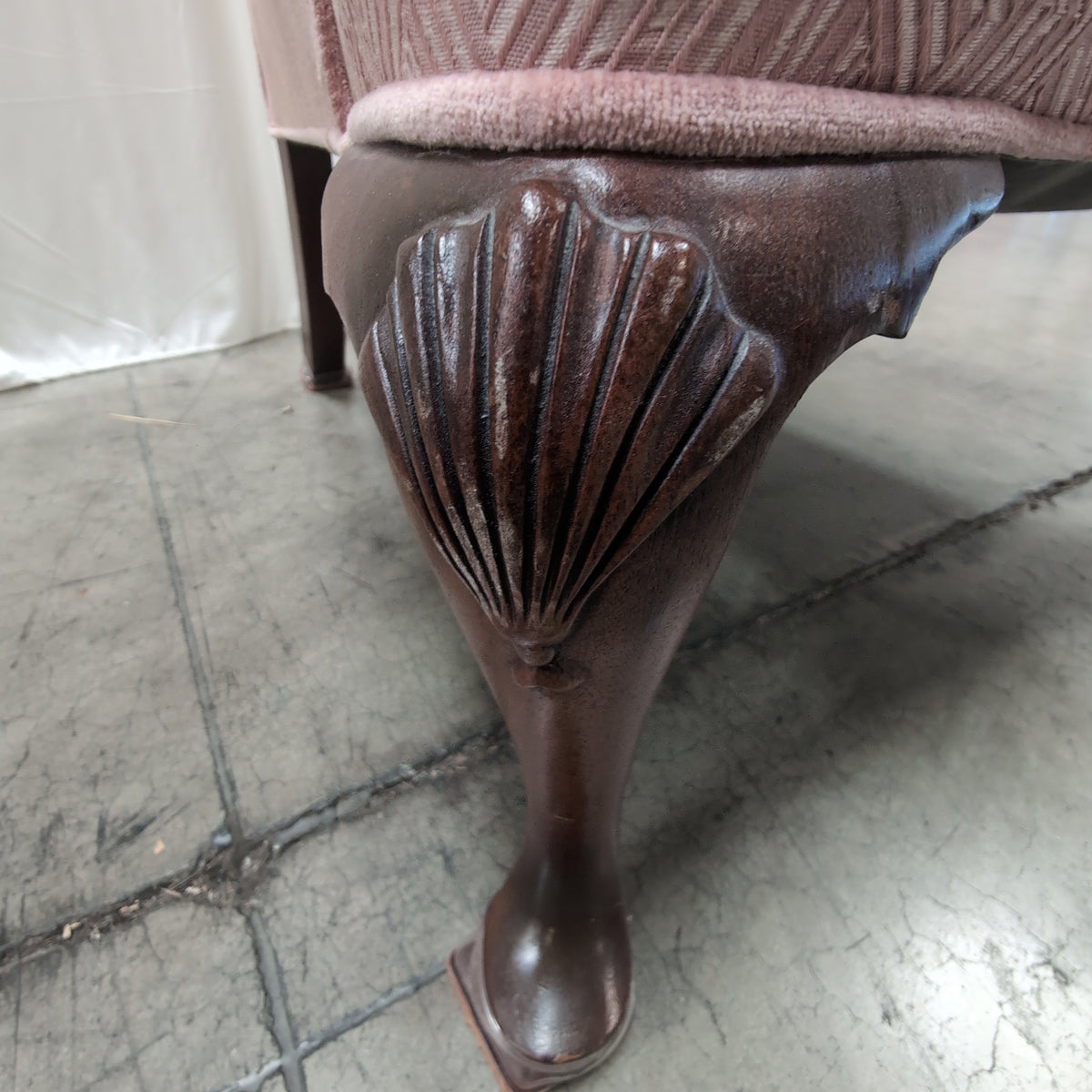 Mauve Upholstered Wingback Chair with Geometric Pattern