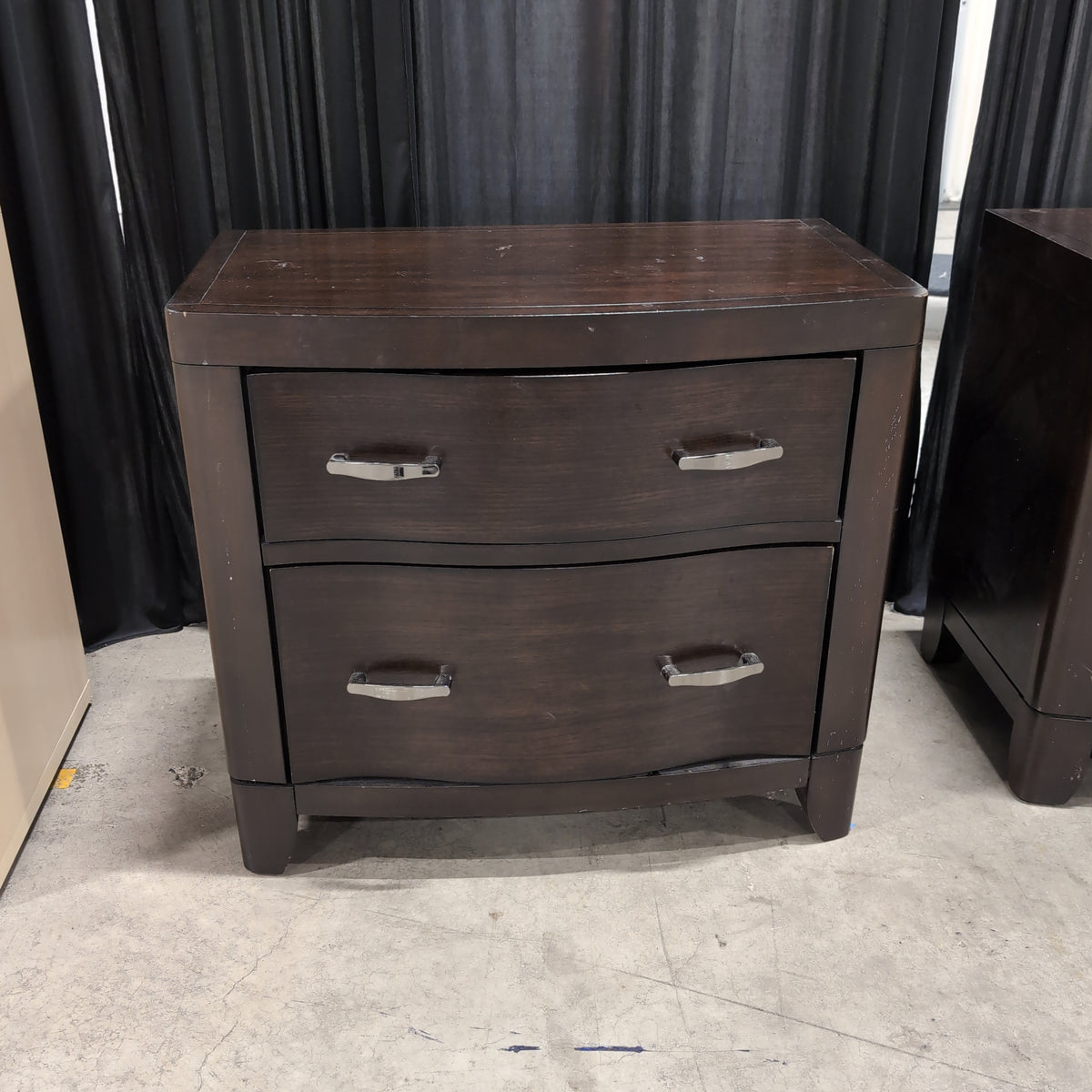 Dark Wood Two-Drawer Nightstand with Curved Front
