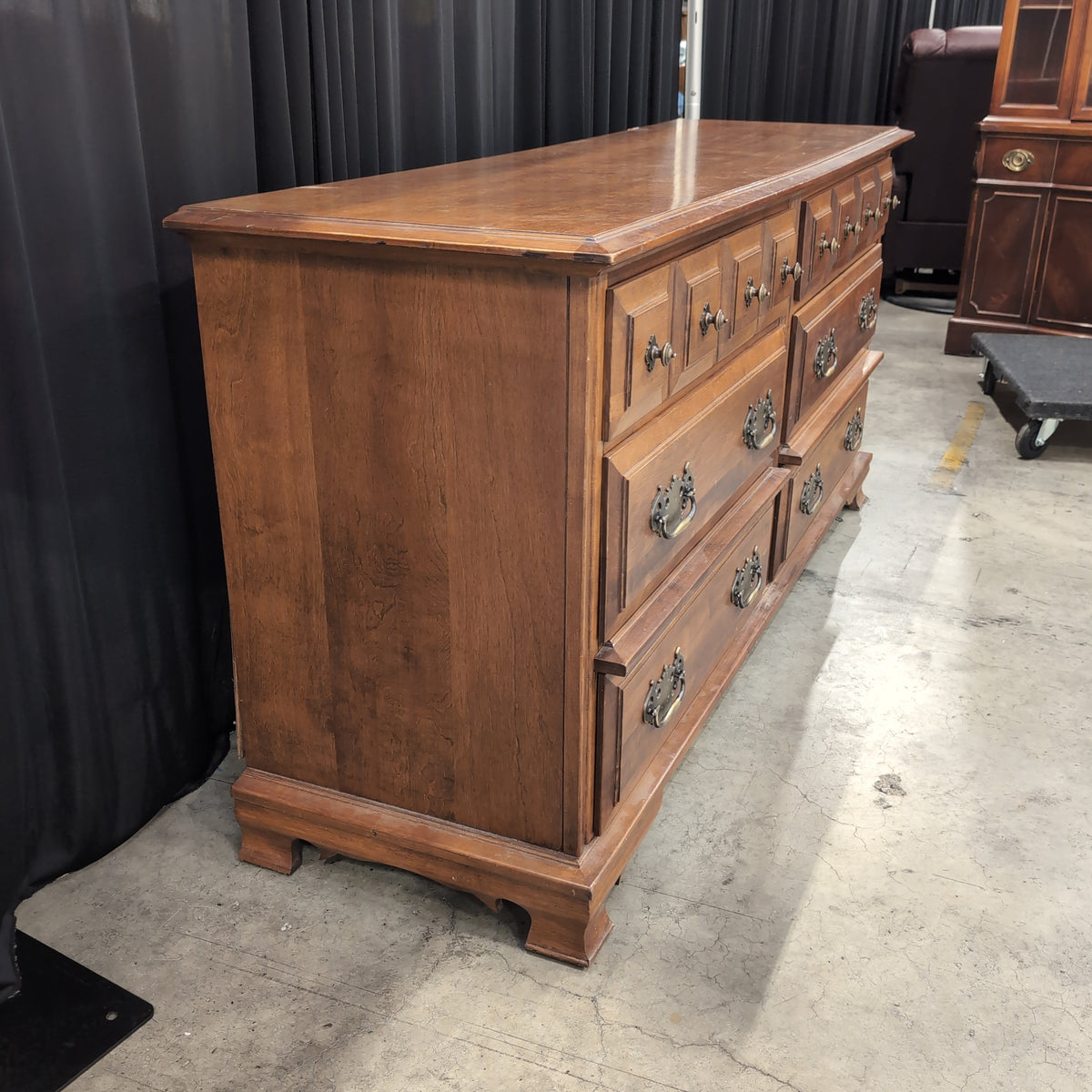 Traditional Brown Wood Dresser with Ornate Hardware