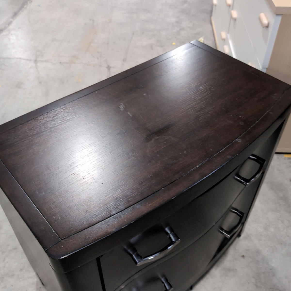 Dark Wood Two-Drawer Nightstand with Curved Front
