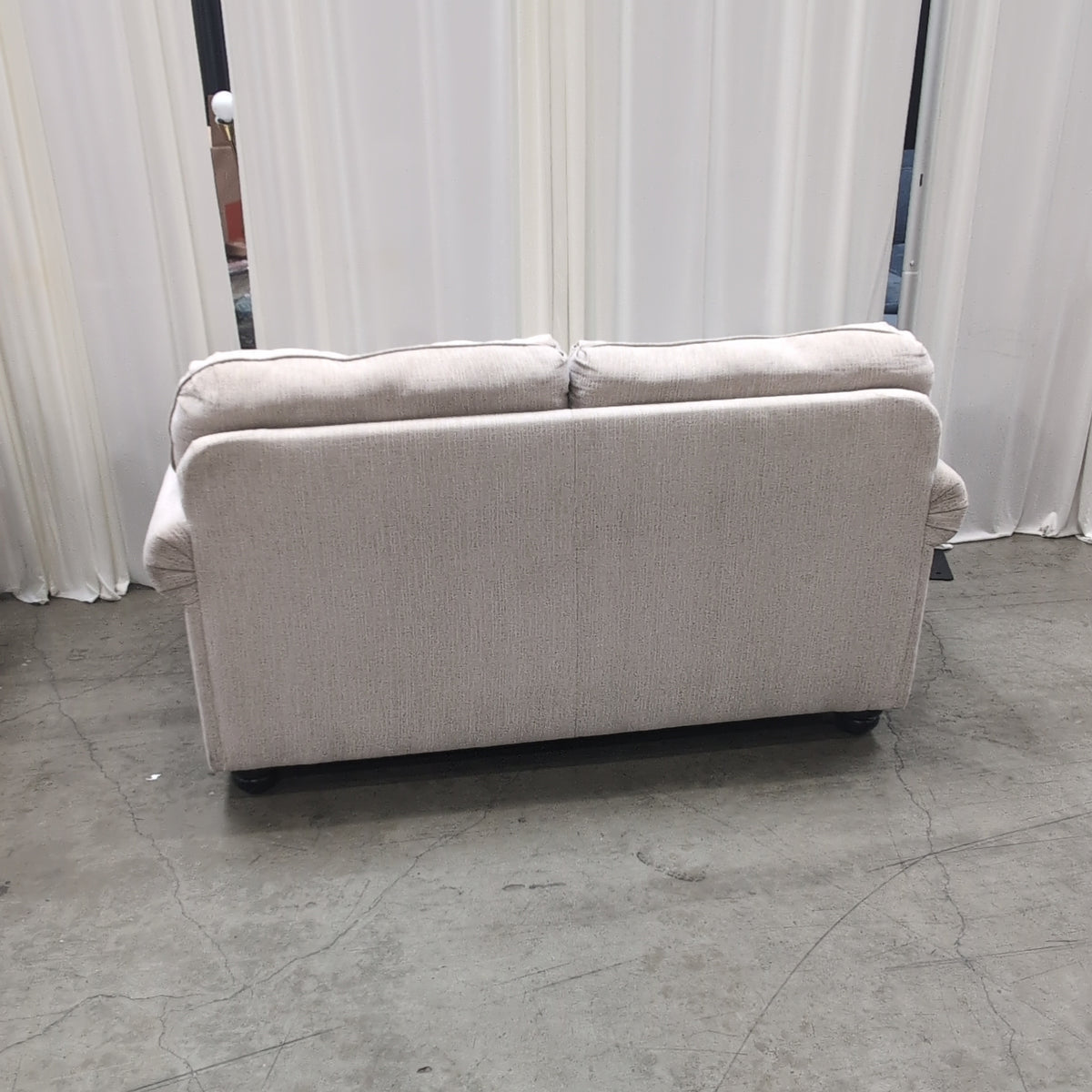 Textured Beige Fabric Loveseat with Nailhead Trim