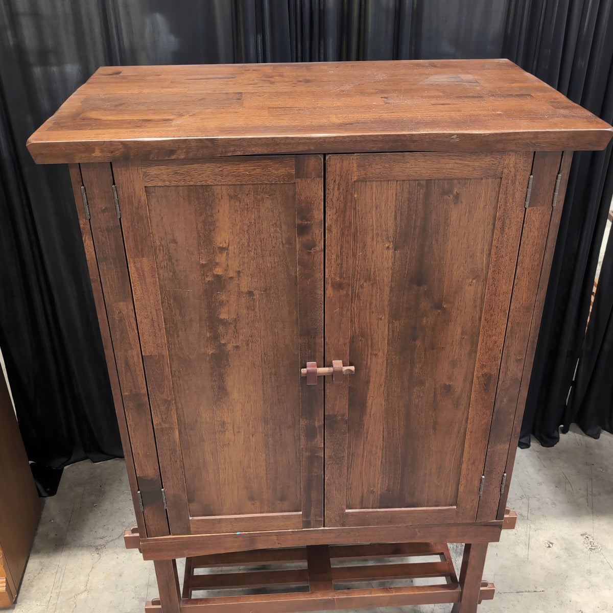 Rustic Dark Wood Two-Door Armoire with Slatted Base