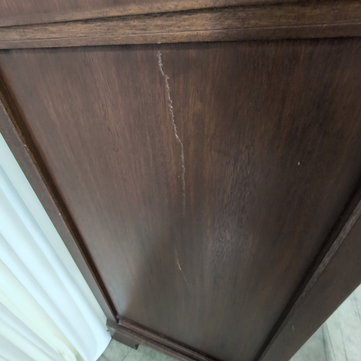 Brown Wood Six-Drawer Dresser with Ornate Hardware