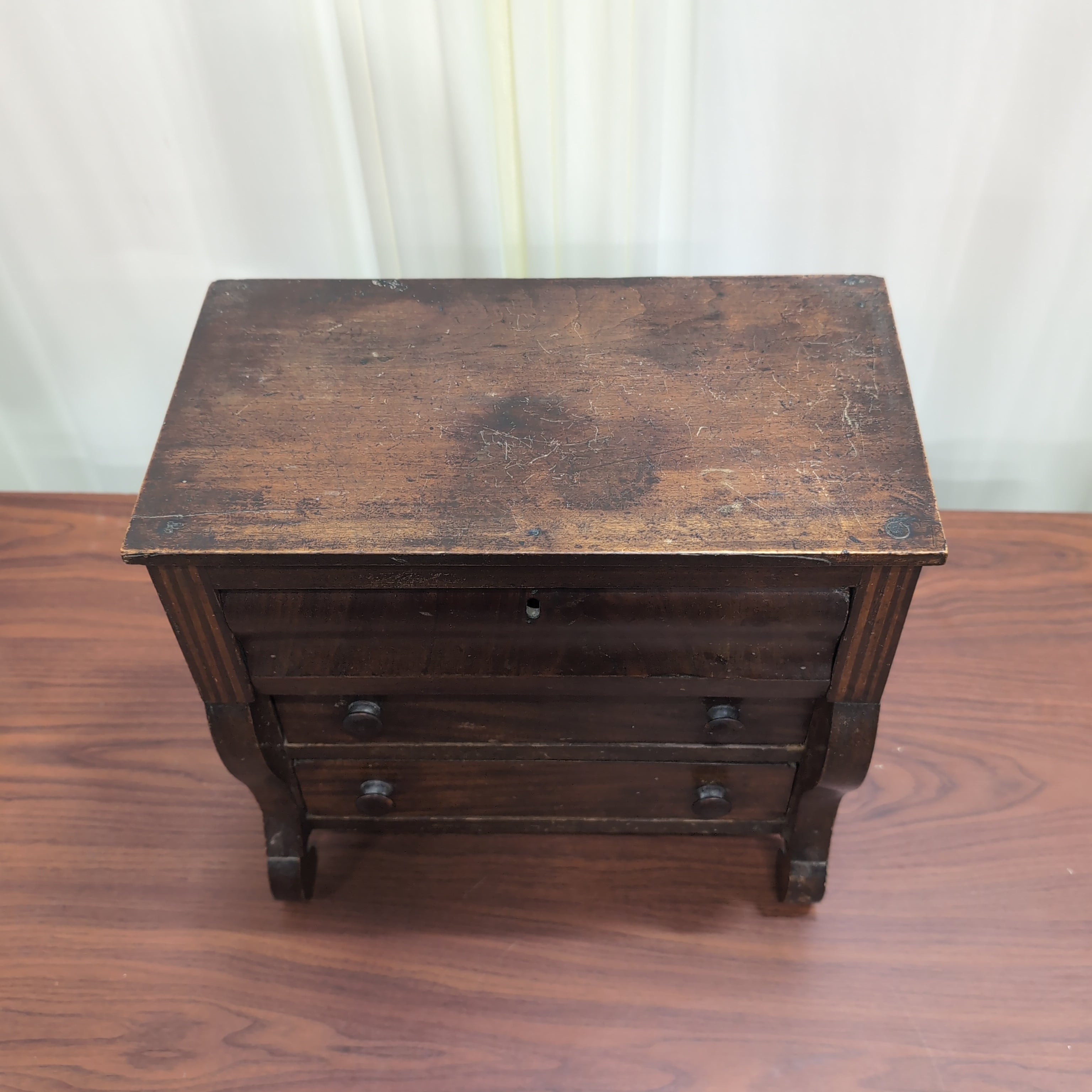 Traditional Dark Wood Three-Drawer Nightstand
