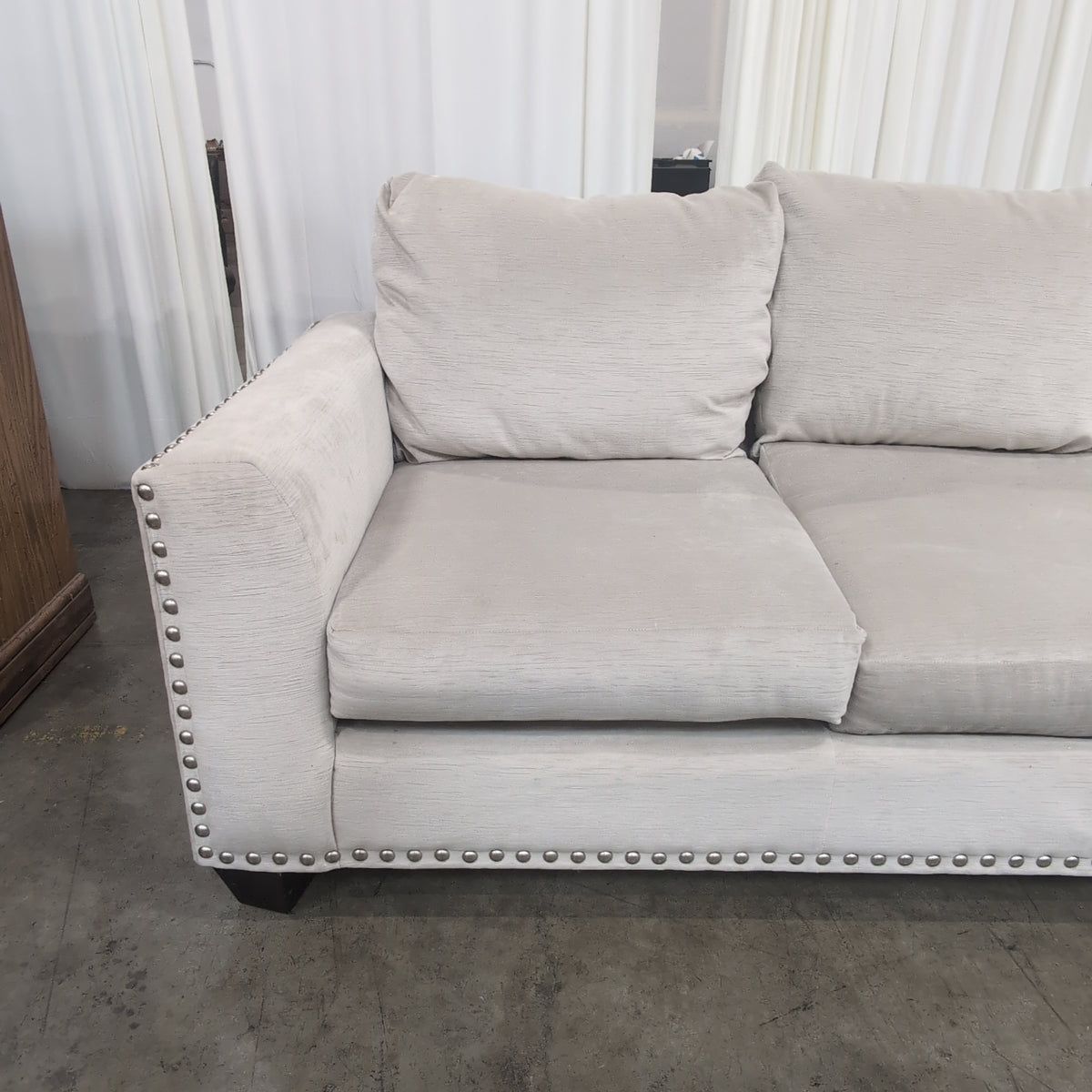 Light Beige Microfiber Couch with Nailhead Trim