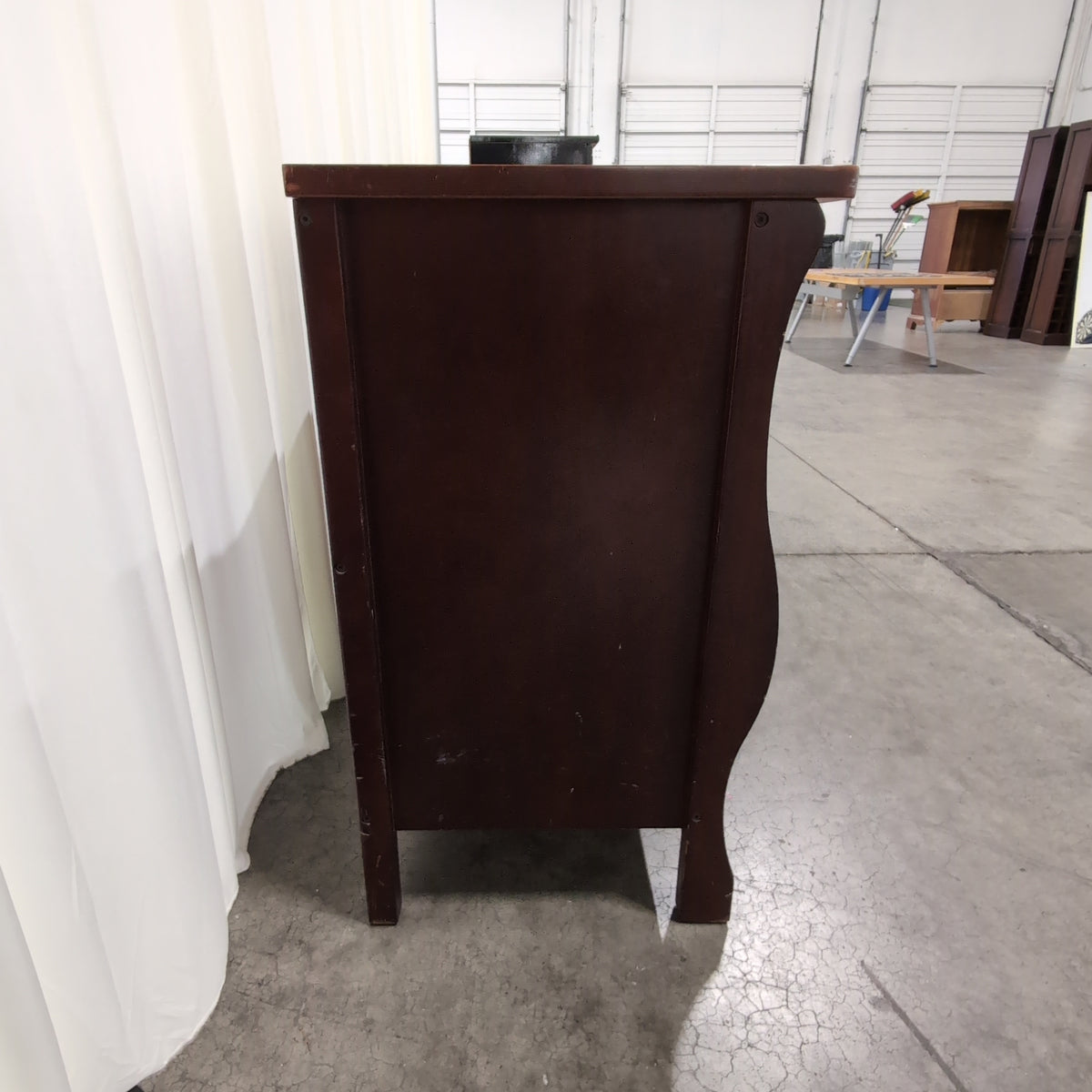 Reddish Brown Wood Dresser with Cabinet Door