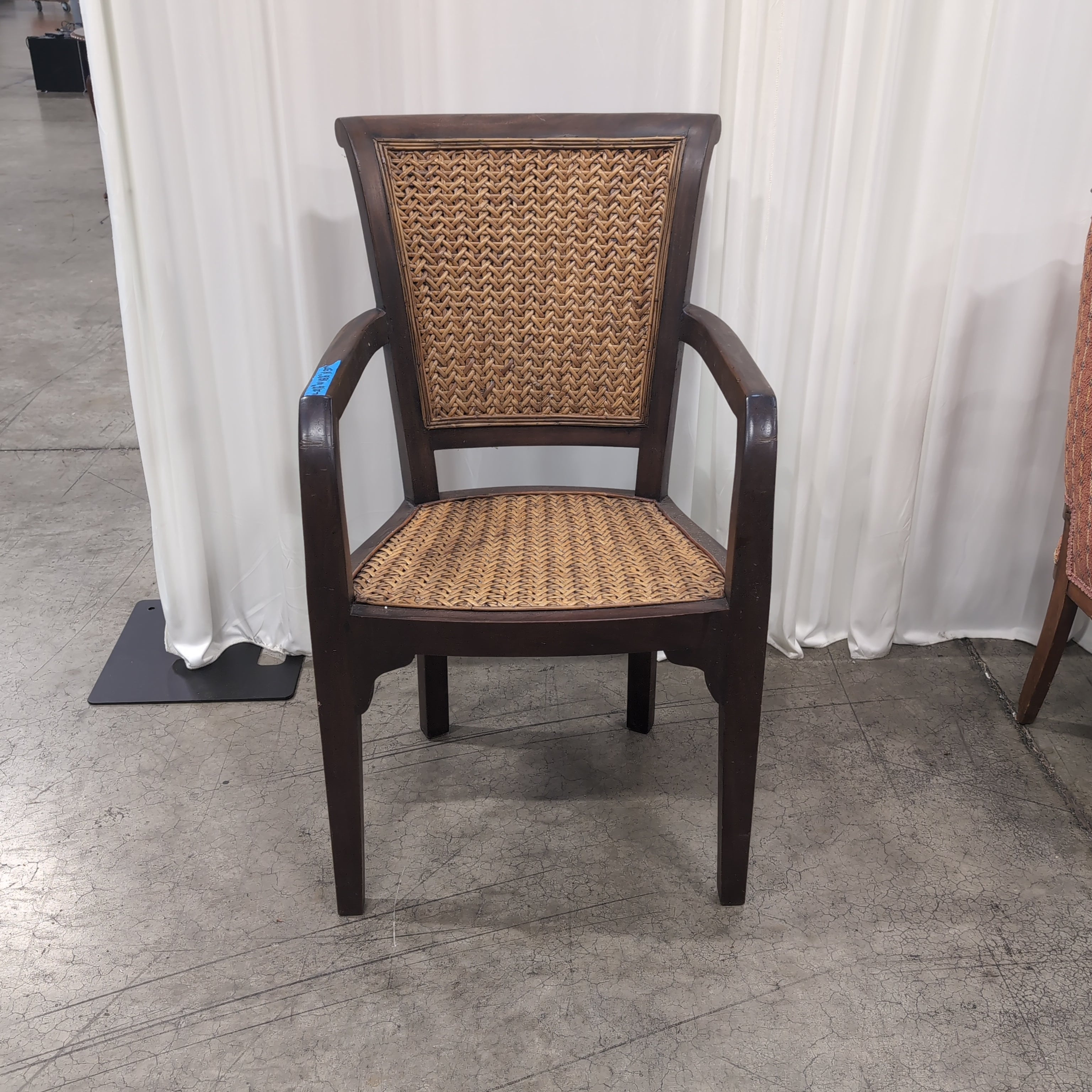 Dark Wood Armchair with Woven Cane Details