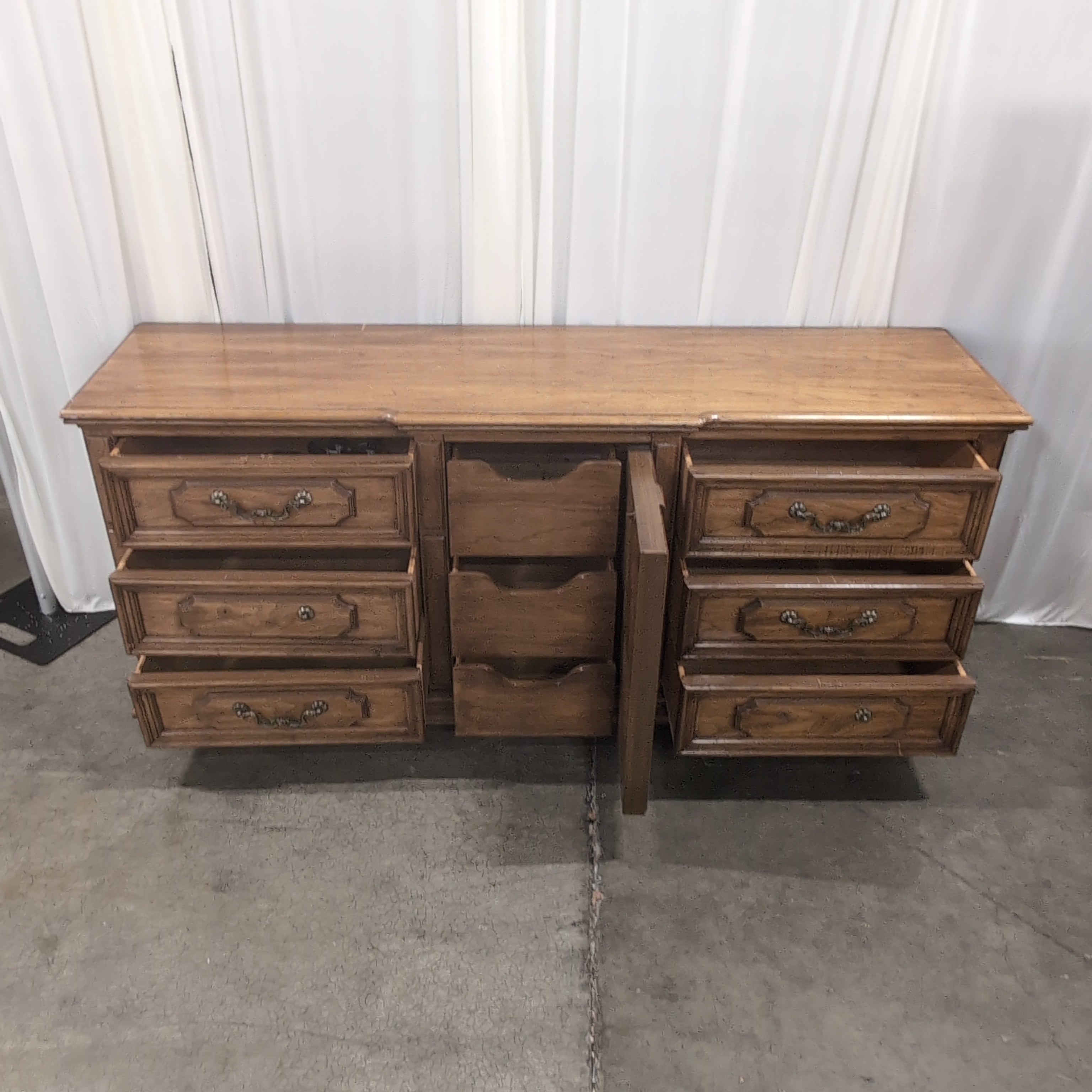 Traditional Brown Wood Dresser with Ornate Hardware