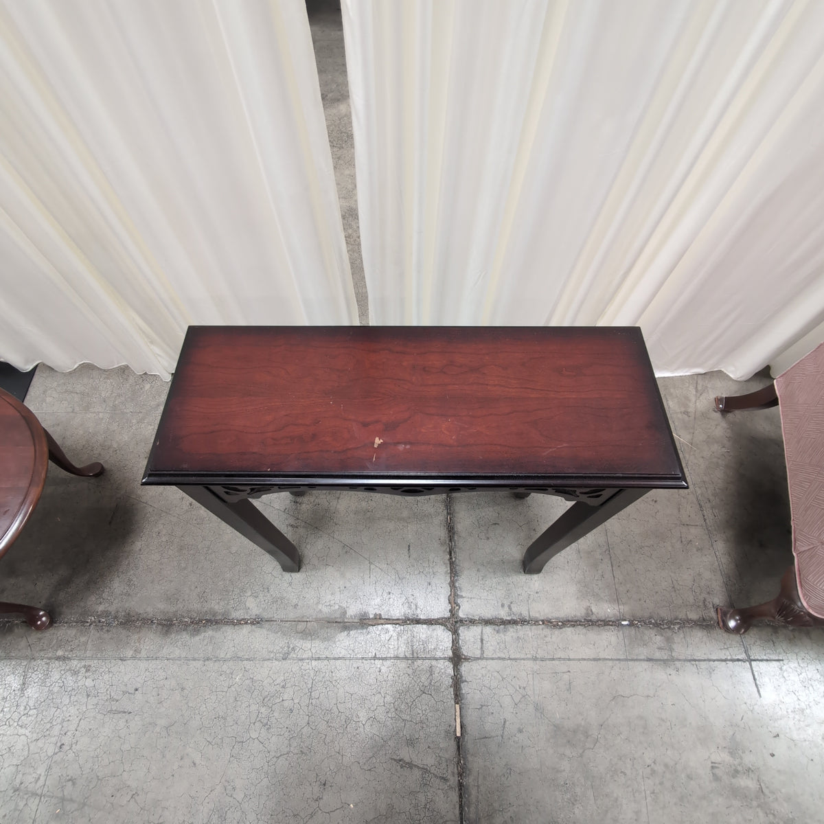 Dark Stained Wood Console Table with Ornate Details