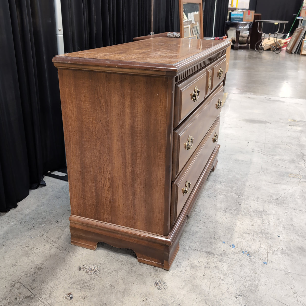 Traditional Brown Wood Dresser with Ornate Hardware
