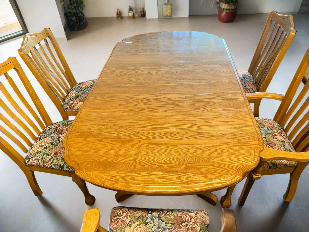 Oval Oak Dinning Table with Six Chairs with Floral Accent