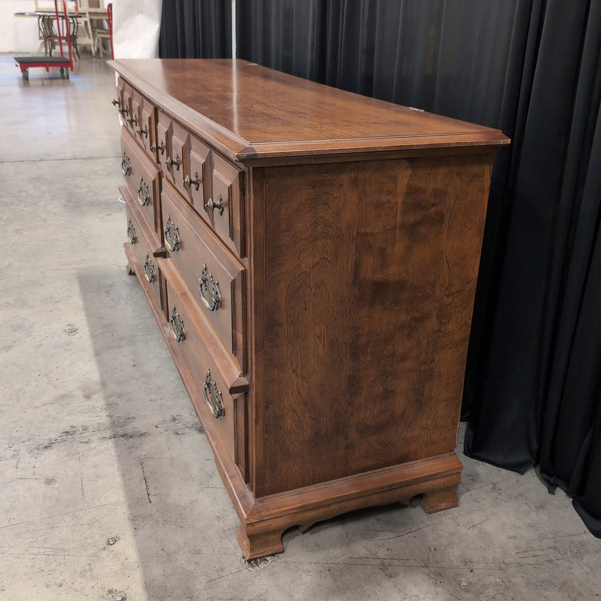 Traditional Brown Wood Dresser with Ornate Hardware