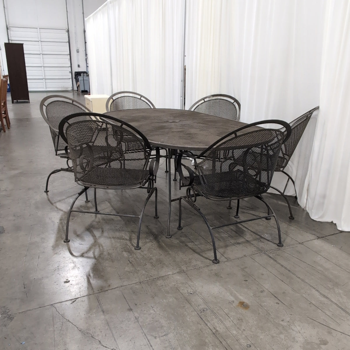 Dark Metal Oval Outdoor Table with Umbrella Hole