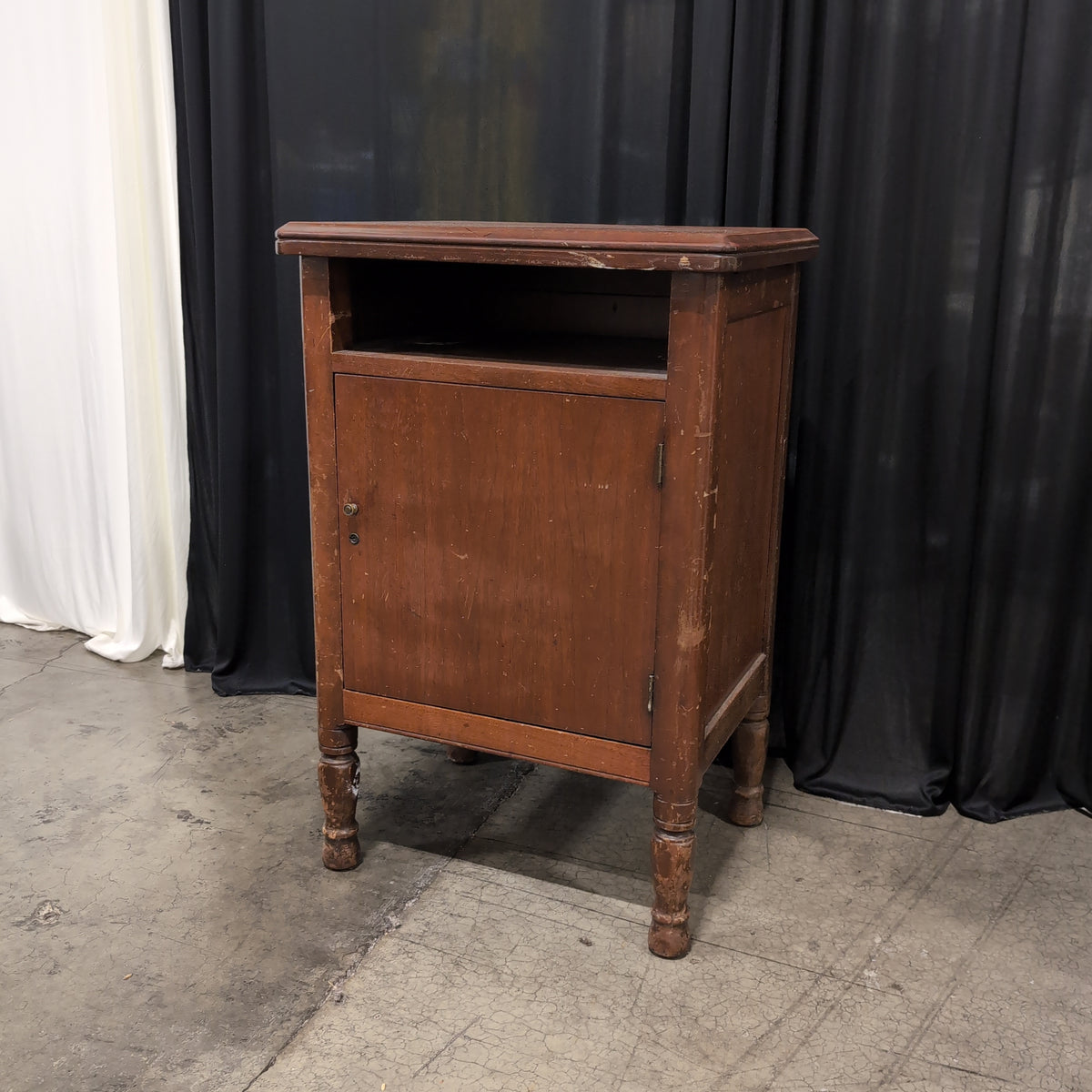 Traditional Reddish-Brown Wood Nightstand with Cabinet Door