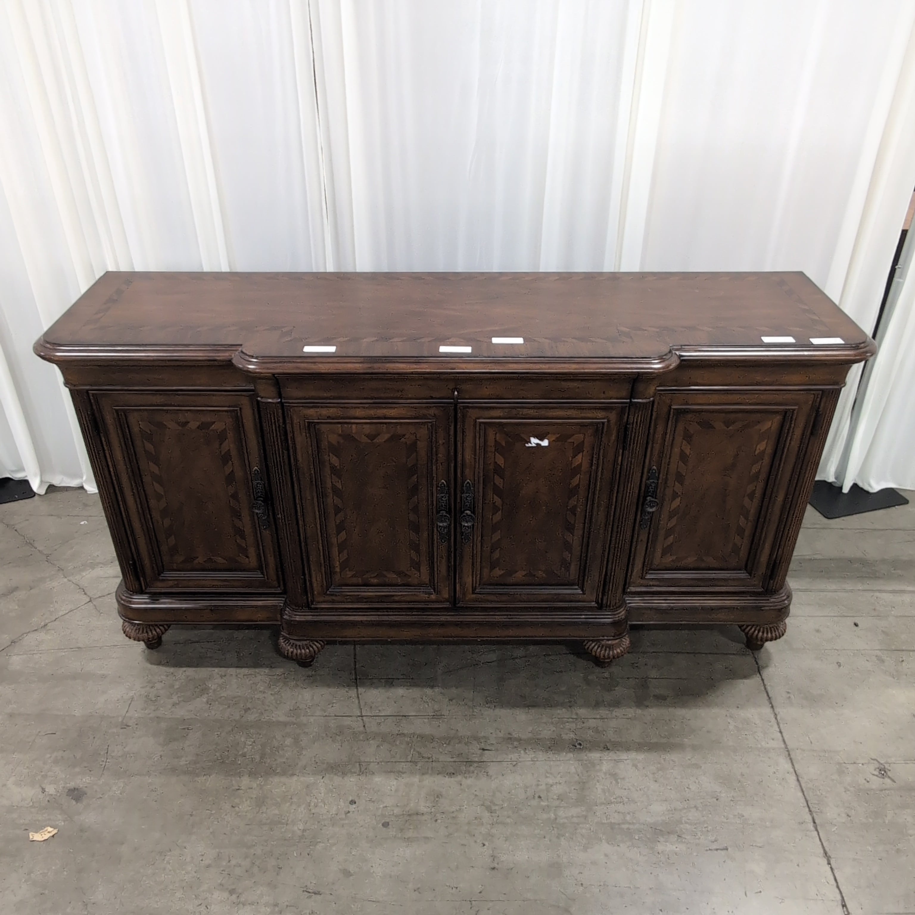 Traditional Dark Wood Buffet with Carved Details