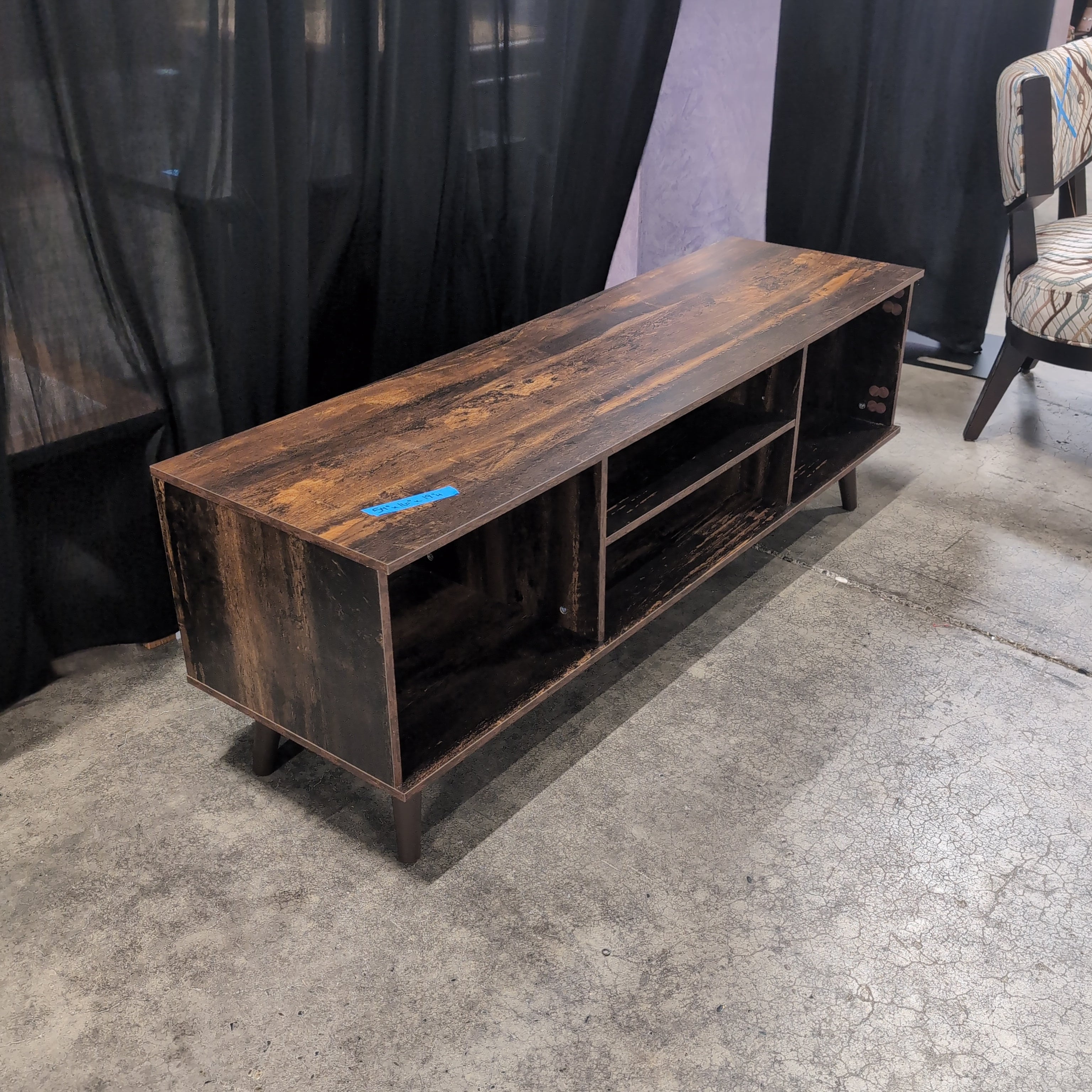 Distressed Dark Wood Multi-Shelf TV Stand with Tapered Legs