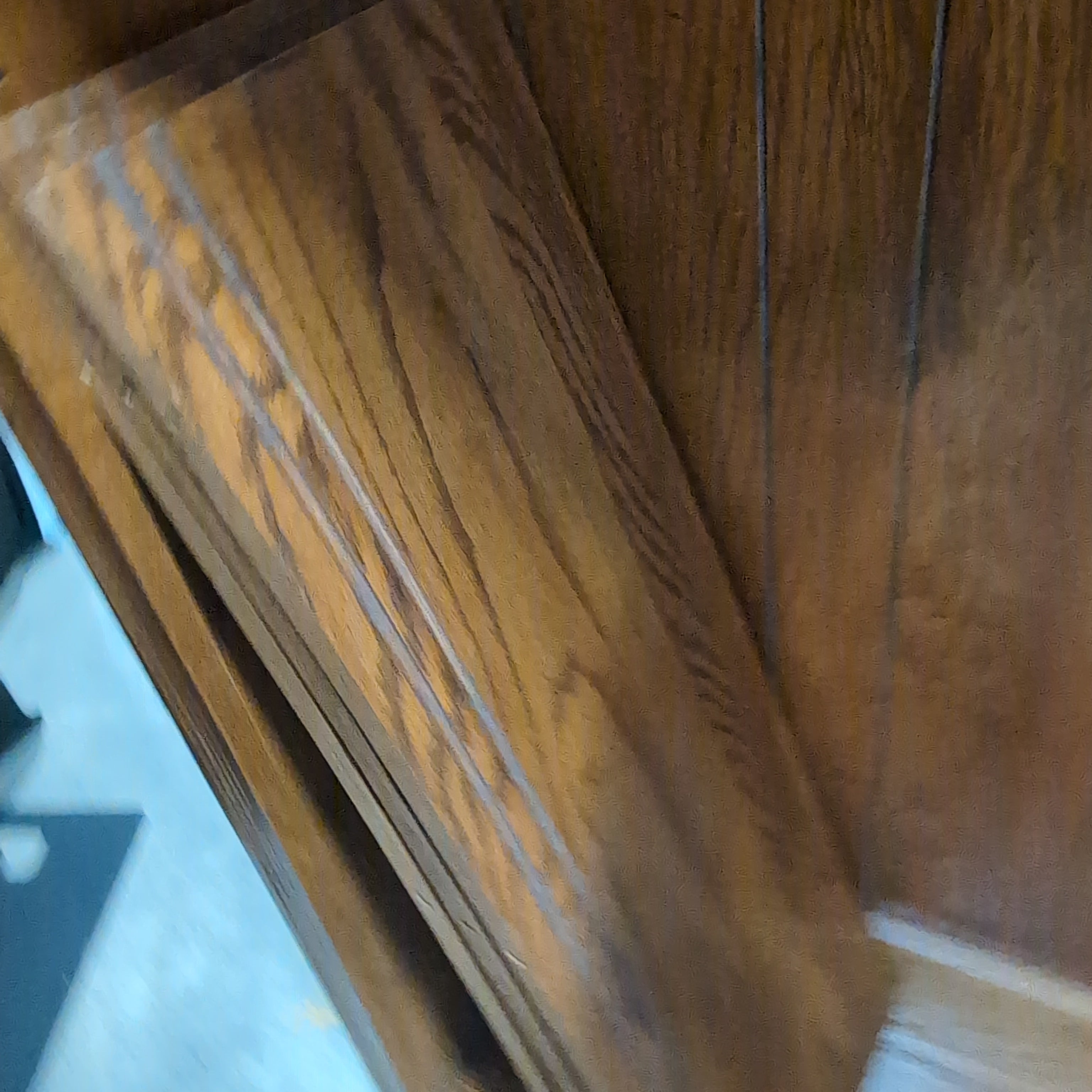 Brown Wood Grain Bookcase with Decorative Crown Molding