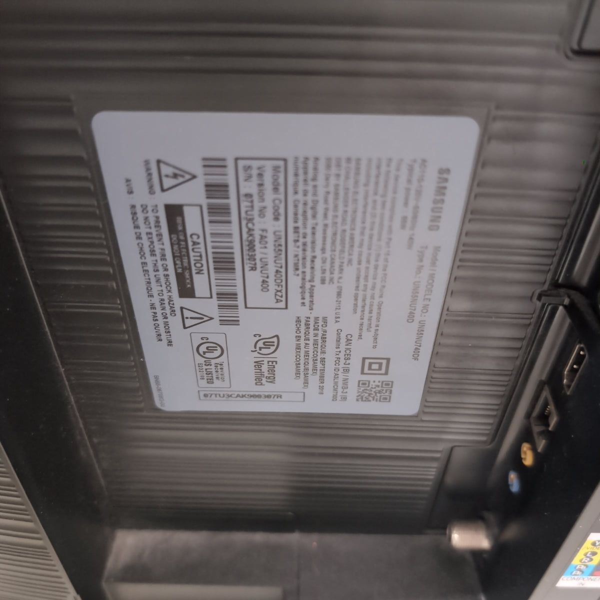 Samsung-Black Flat Screen Television with Stand