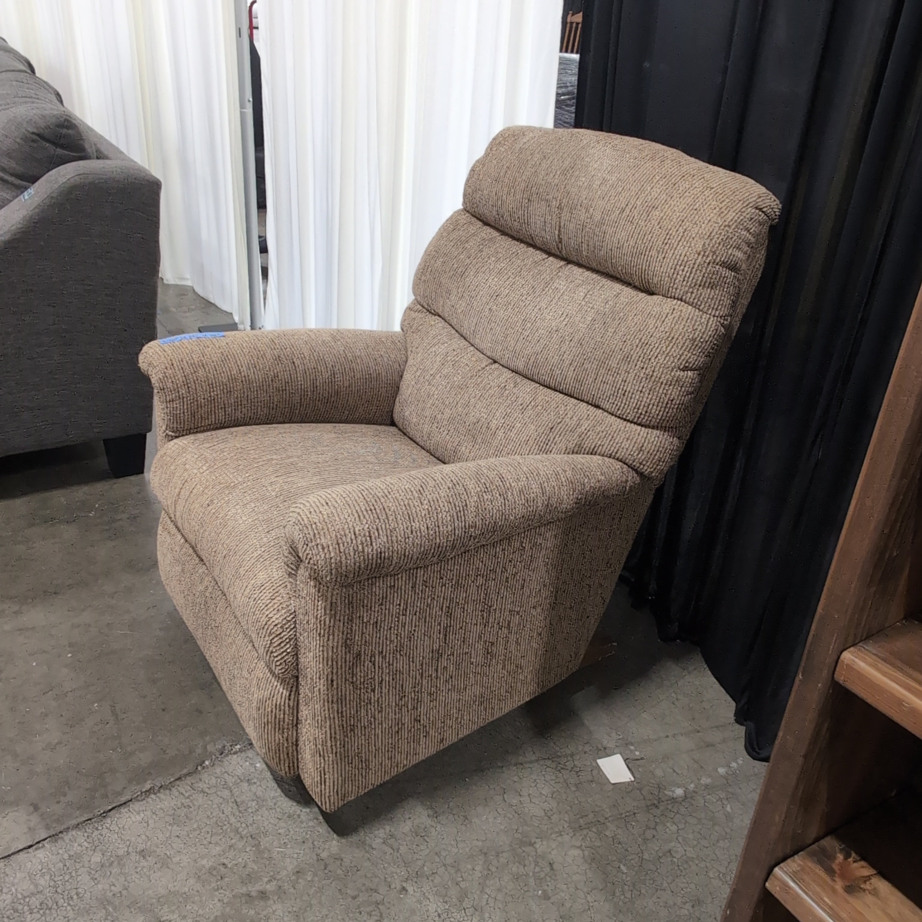 Tan Textured Fabric Recliner with Rolled Arms