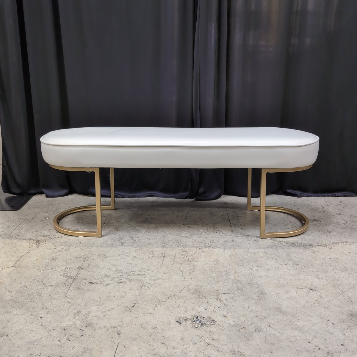 White Upholstered Oval Bench with Gold Base