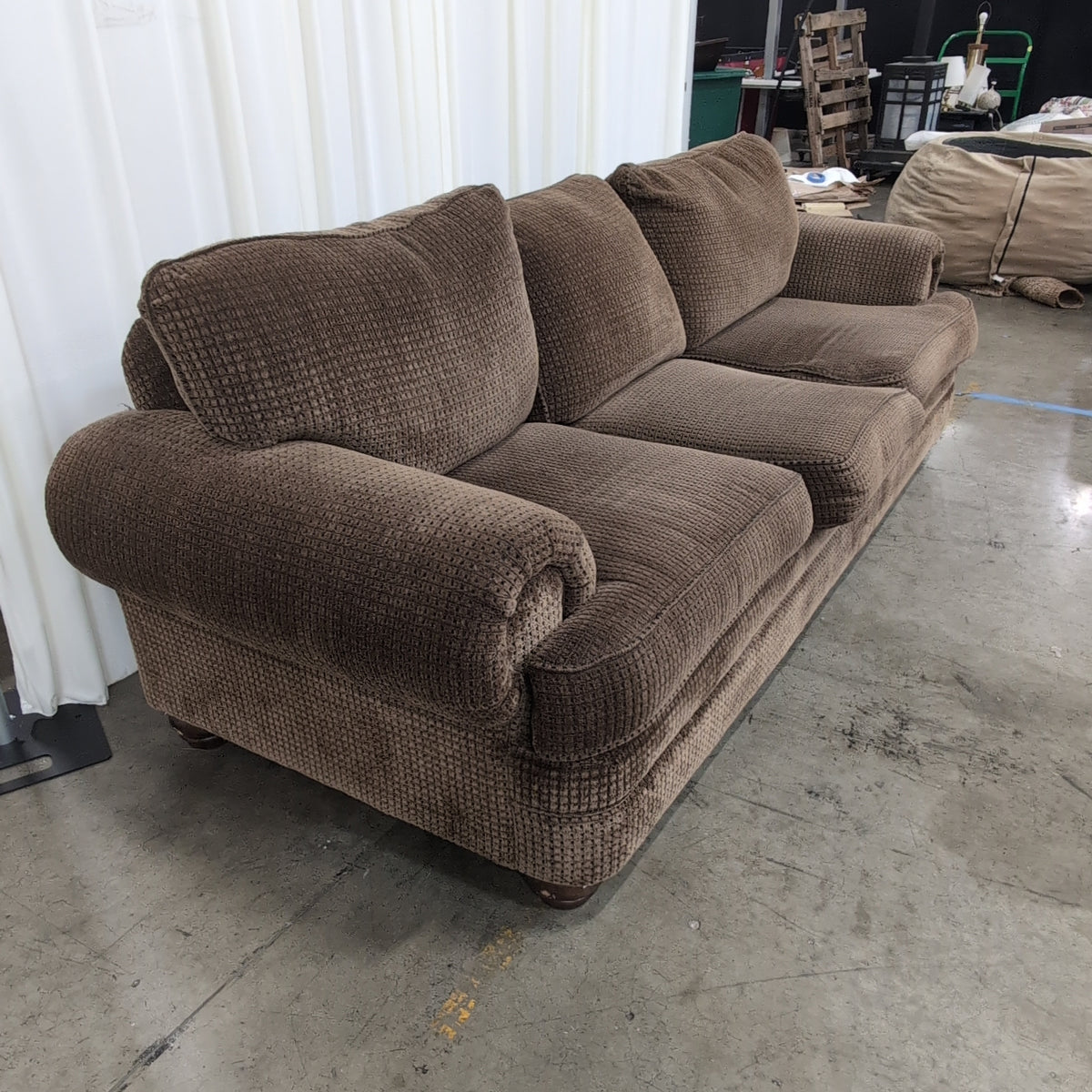 Brown Rolled Arm Three-Cushion Couch in Textured Fabric