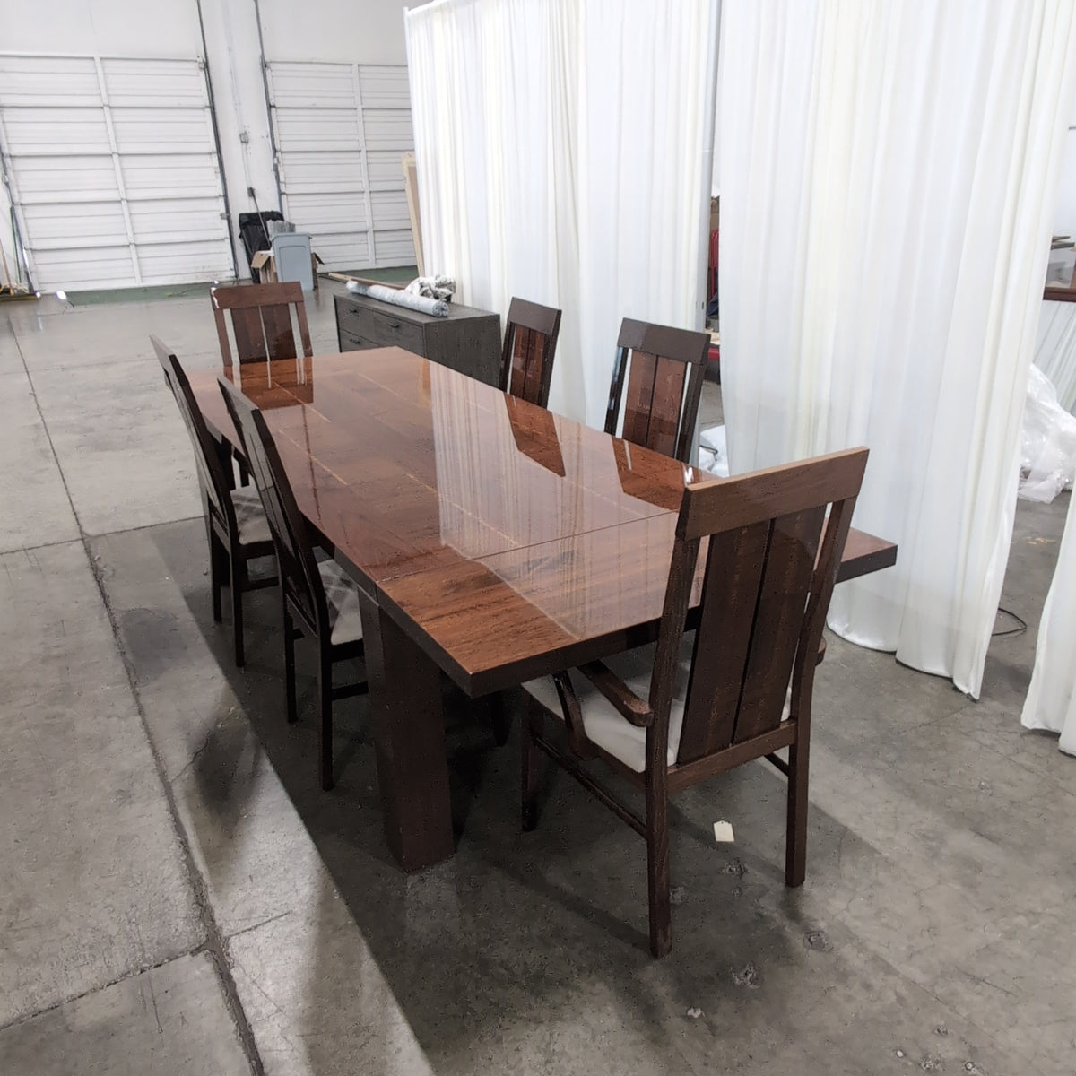 Chestnut brown dining table with 6 matching chairs