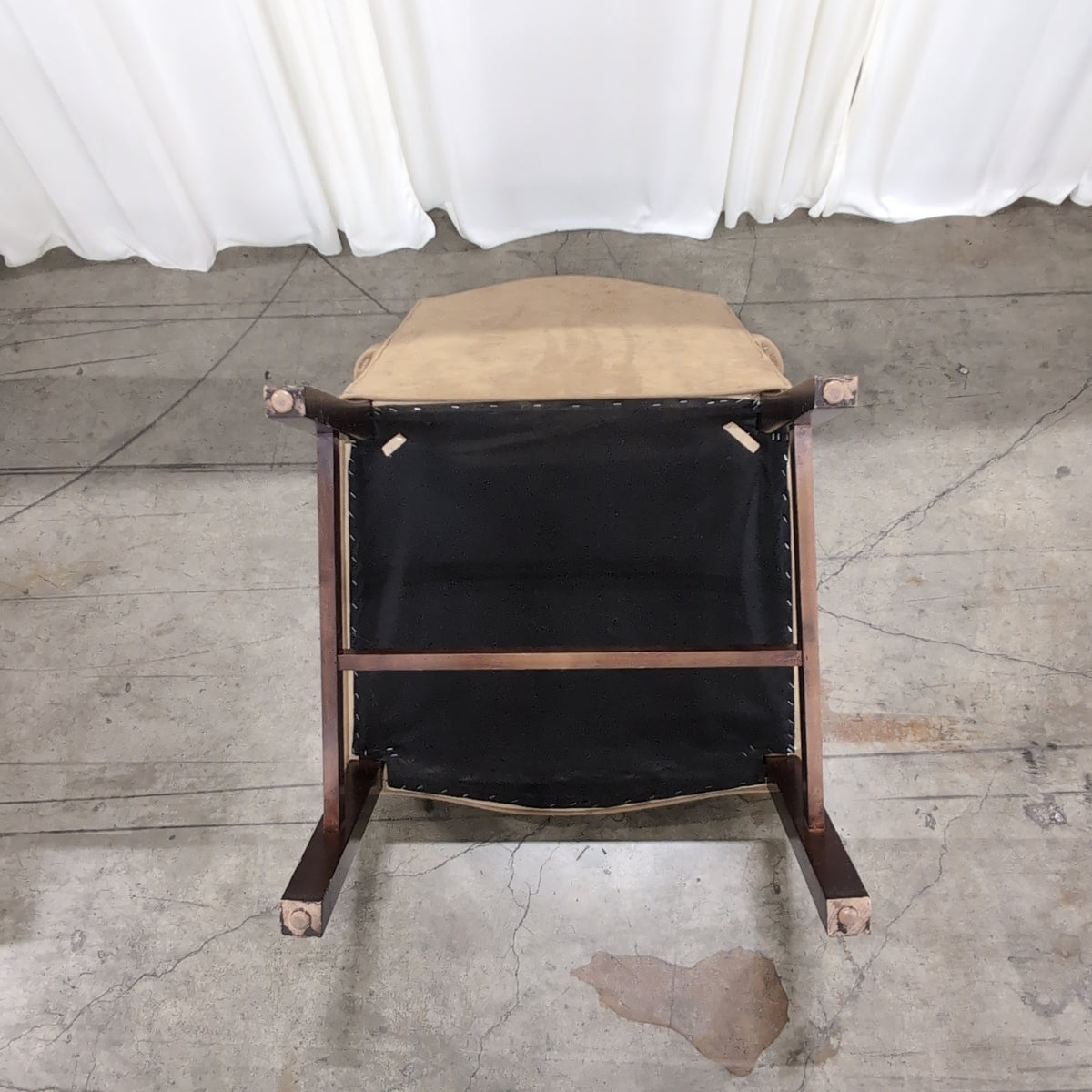 Tan Upholstered Arm Chair with Dark Wood Trim