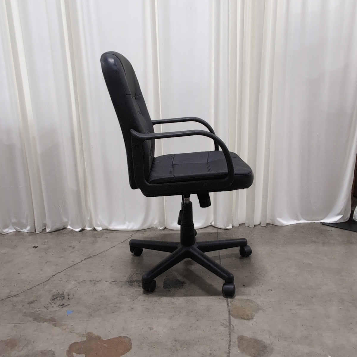 Black Tufted Executive Office Chair in Faux Leather