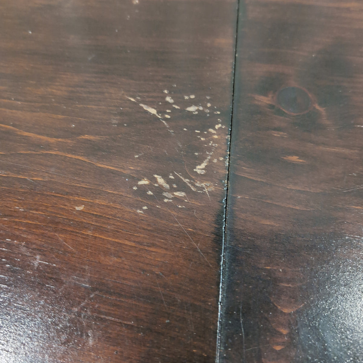 Dark Stained Wood Dining Table with Extension Mechanism