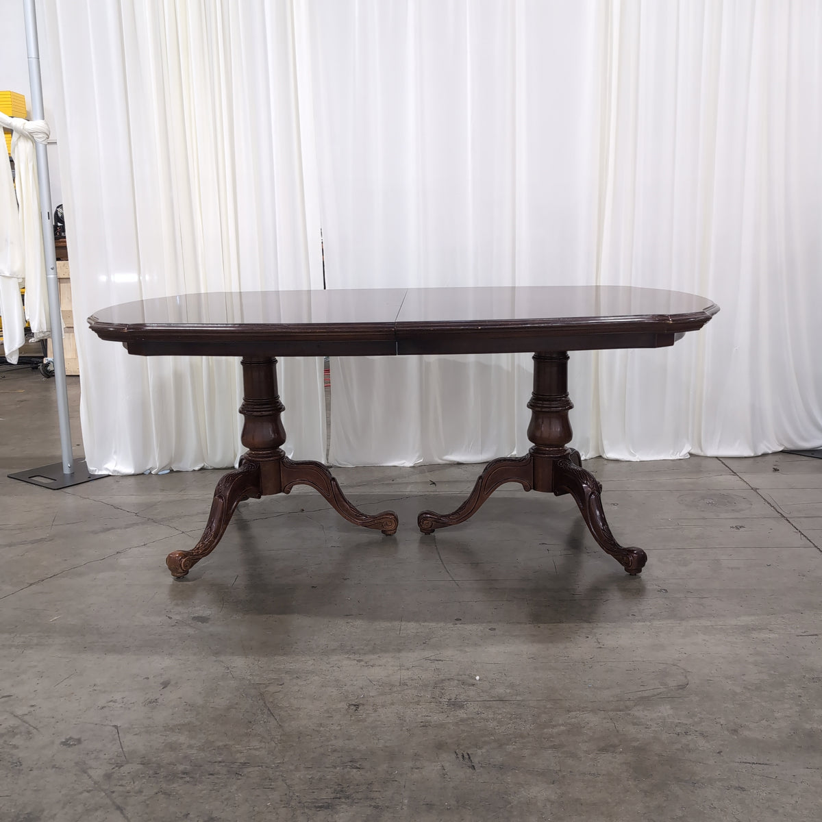 Traditional Dark Wood Oval Dining Table with Pedestal Bases