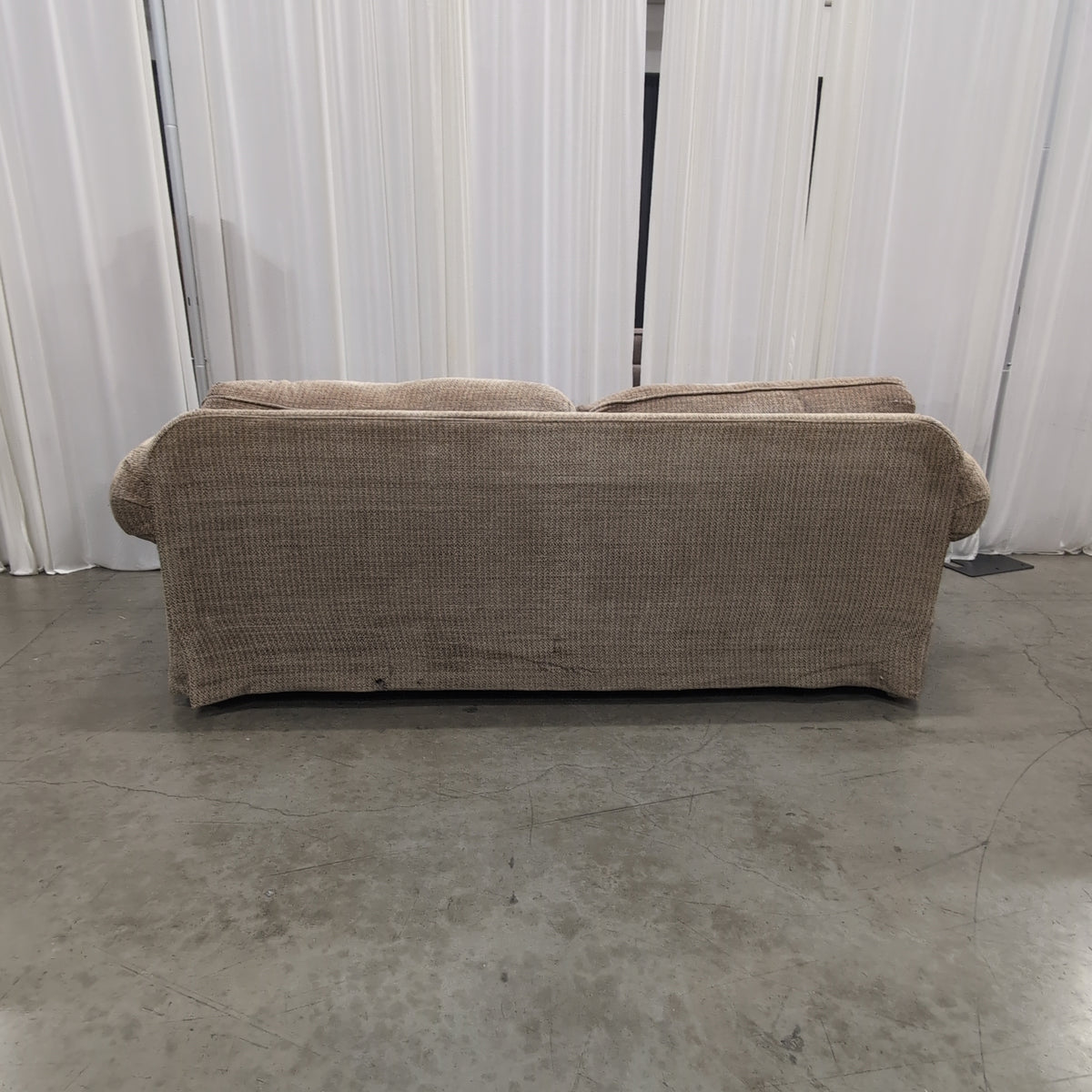 Tan Herringbone Upholstered Rolled Arm Couch with Skirted Base