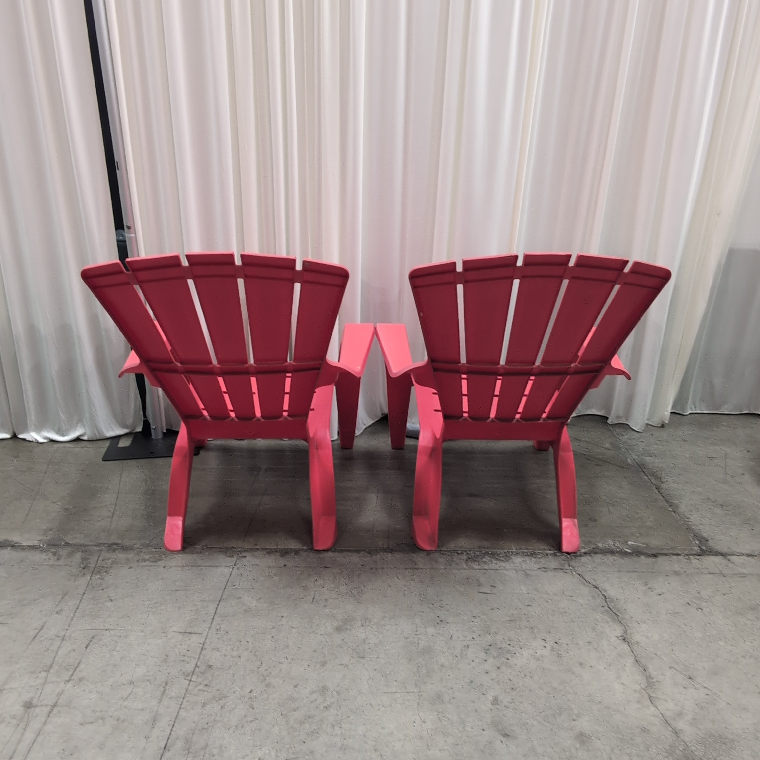 Pair of Red Plastic outdoor chairs