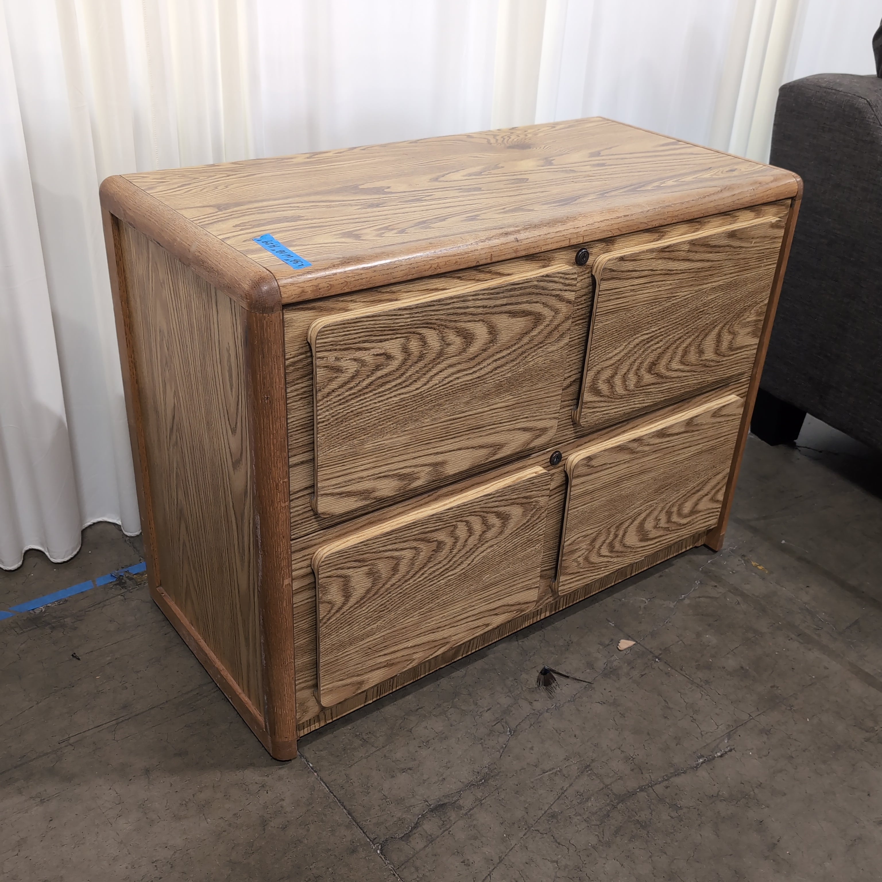Light Oak Wood Four-Drawer Filing Cabinet