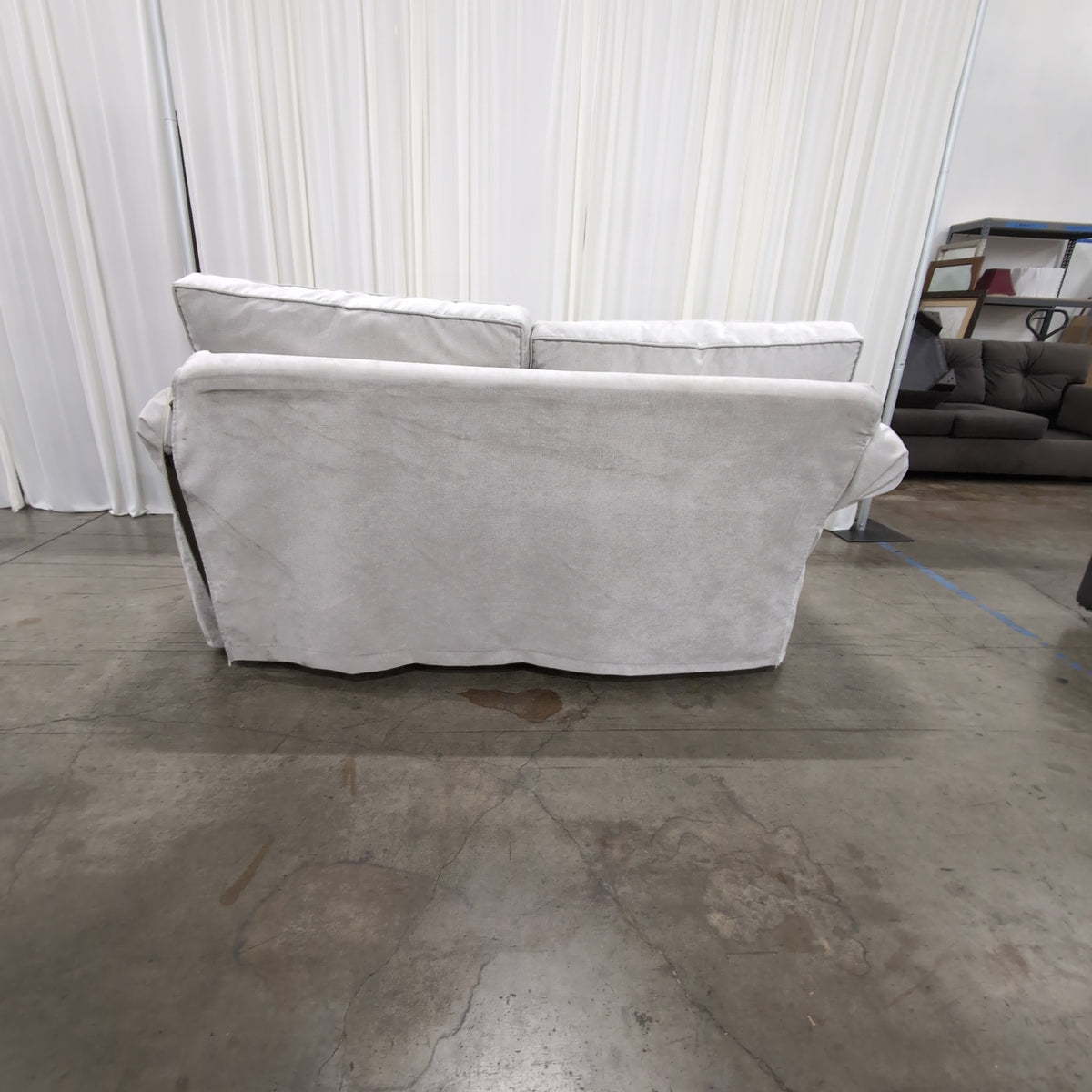 Light Grey Fabric Rolled Arm Loveseat with Skirted Base