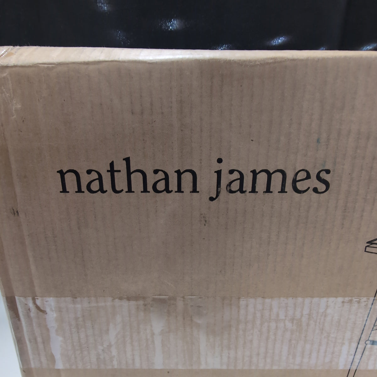 Unknown Item in Sealed Cardboard Box