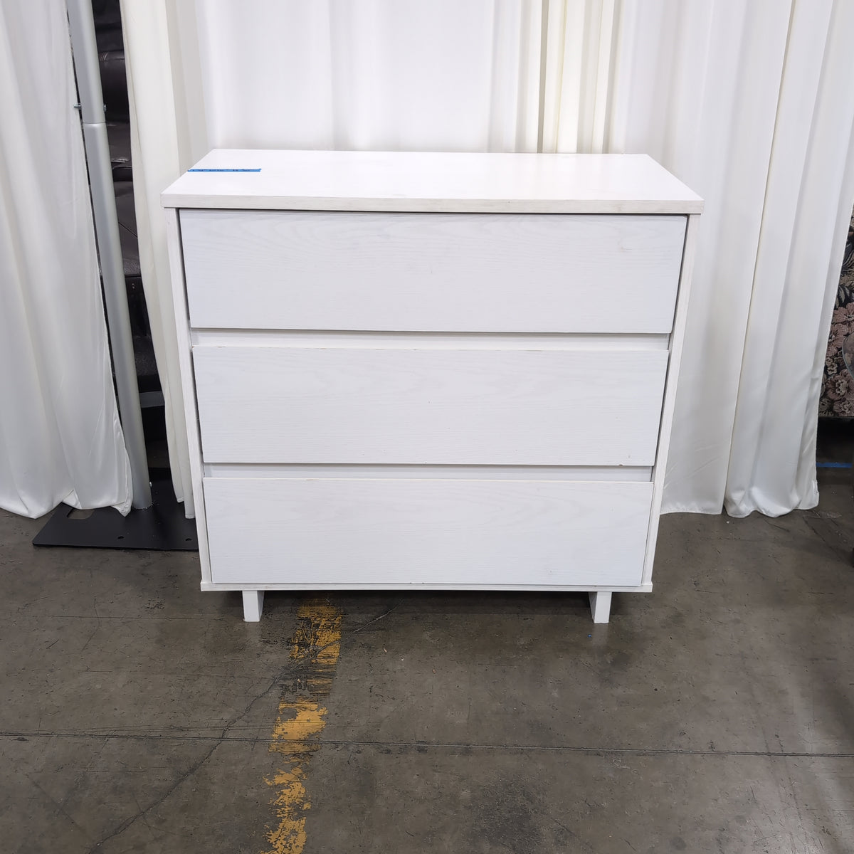 White Three-Drawer Dresser in Wood Finish