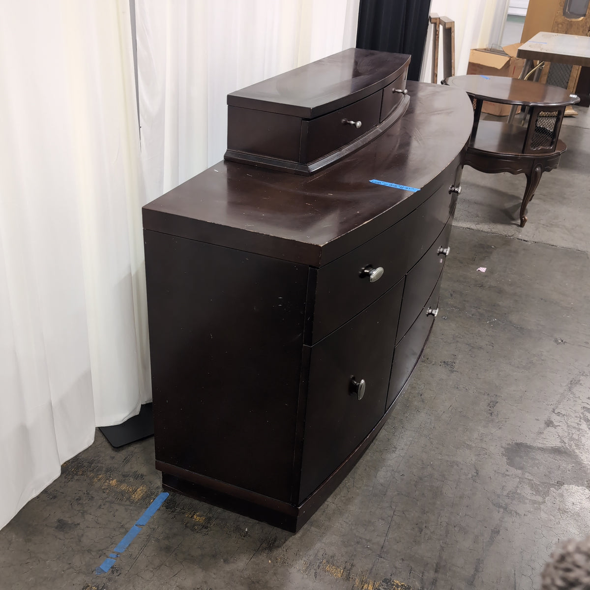 Dark Brown Curved Front Seven-Drawer Dresser