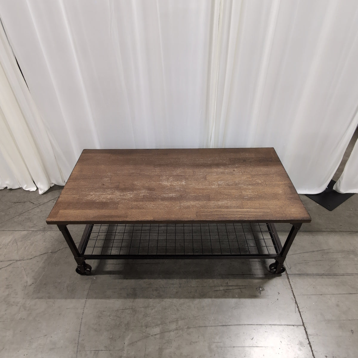 Industrial Wood and Metal Coffee Table with Wheels
