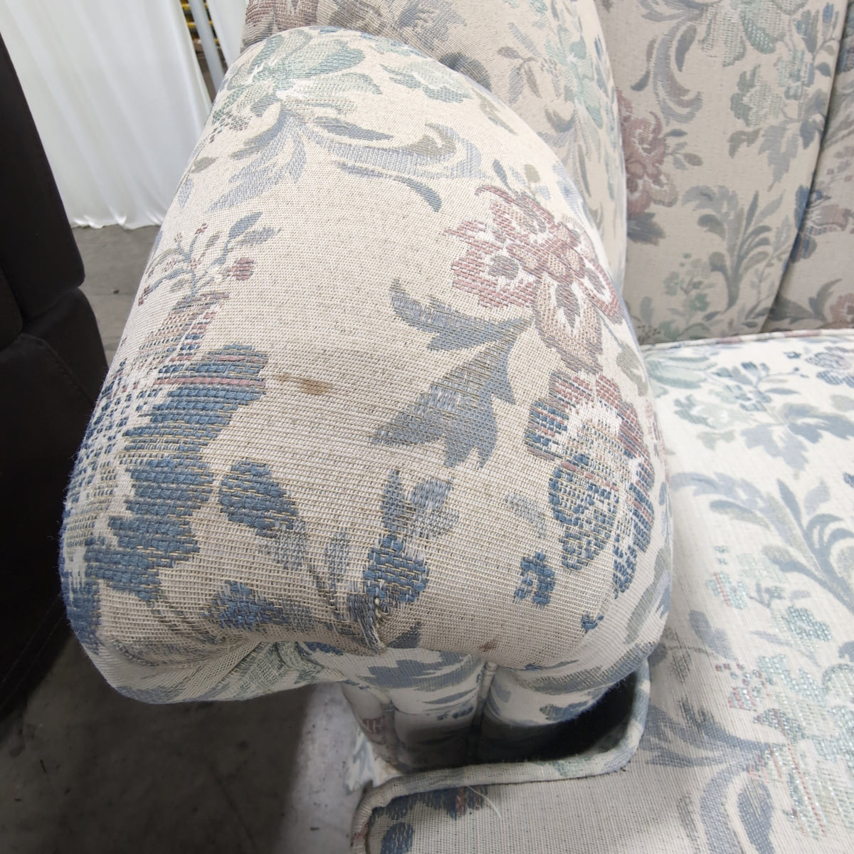 Floral Pattern Skirted Upholstered Couch with Rolled Arms