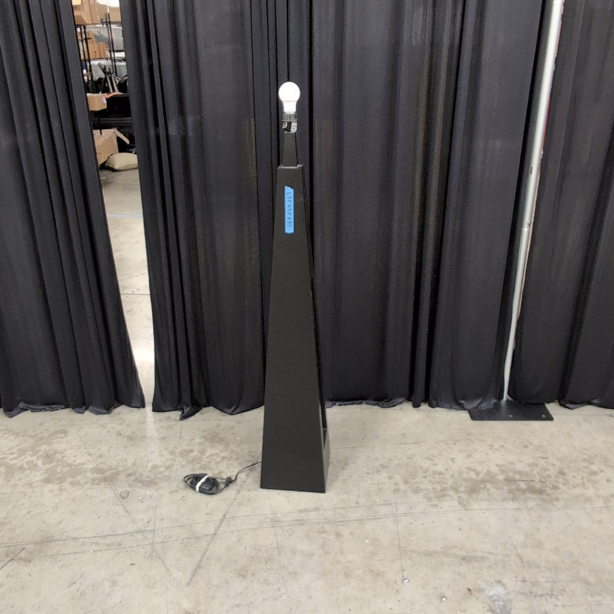 Tall Black Tapered Floor Lamp with Exposed Bulb