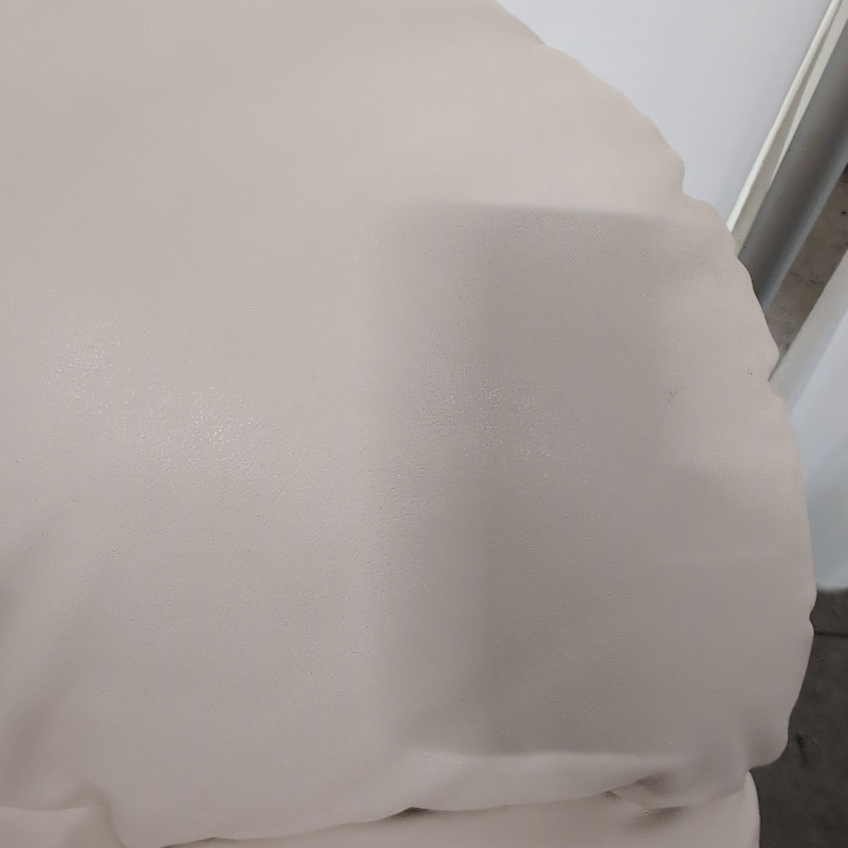 Cream Rolled Arm Loveseat in Leather