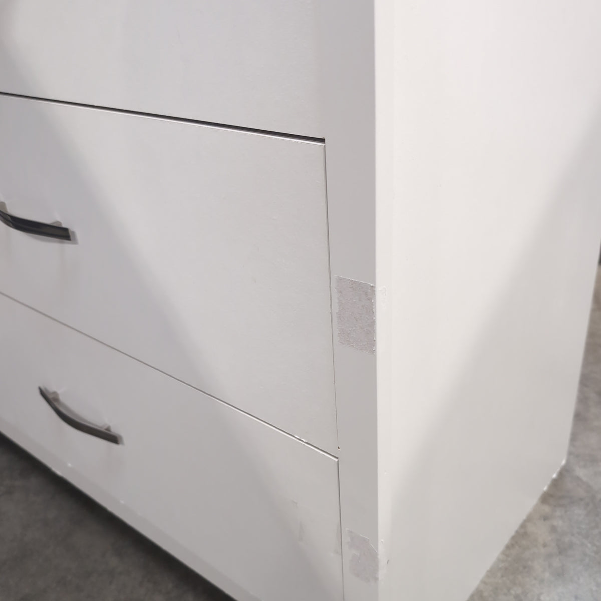 White Five-Drawer Dresser with Curved Handles