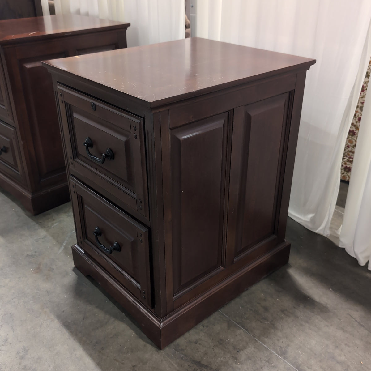 Dark Wood Two-Drawer Filing Cabinet with Ornate Pulls