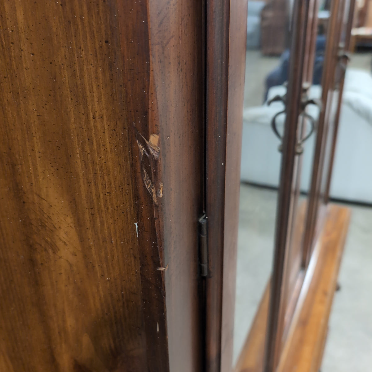 Brown Wood China Cabinet with Ornate Carvings